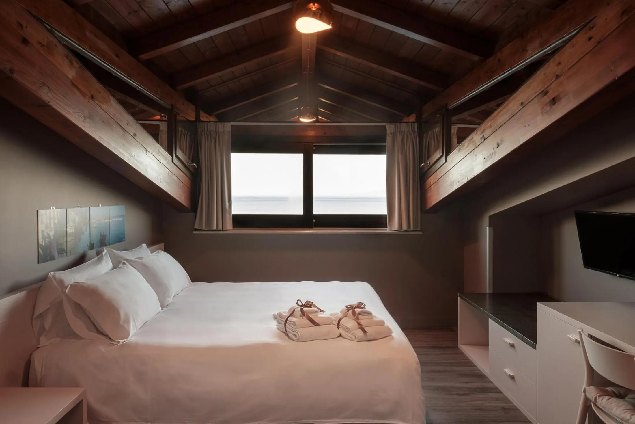 Bed in Il Casato Deluxe Rooms