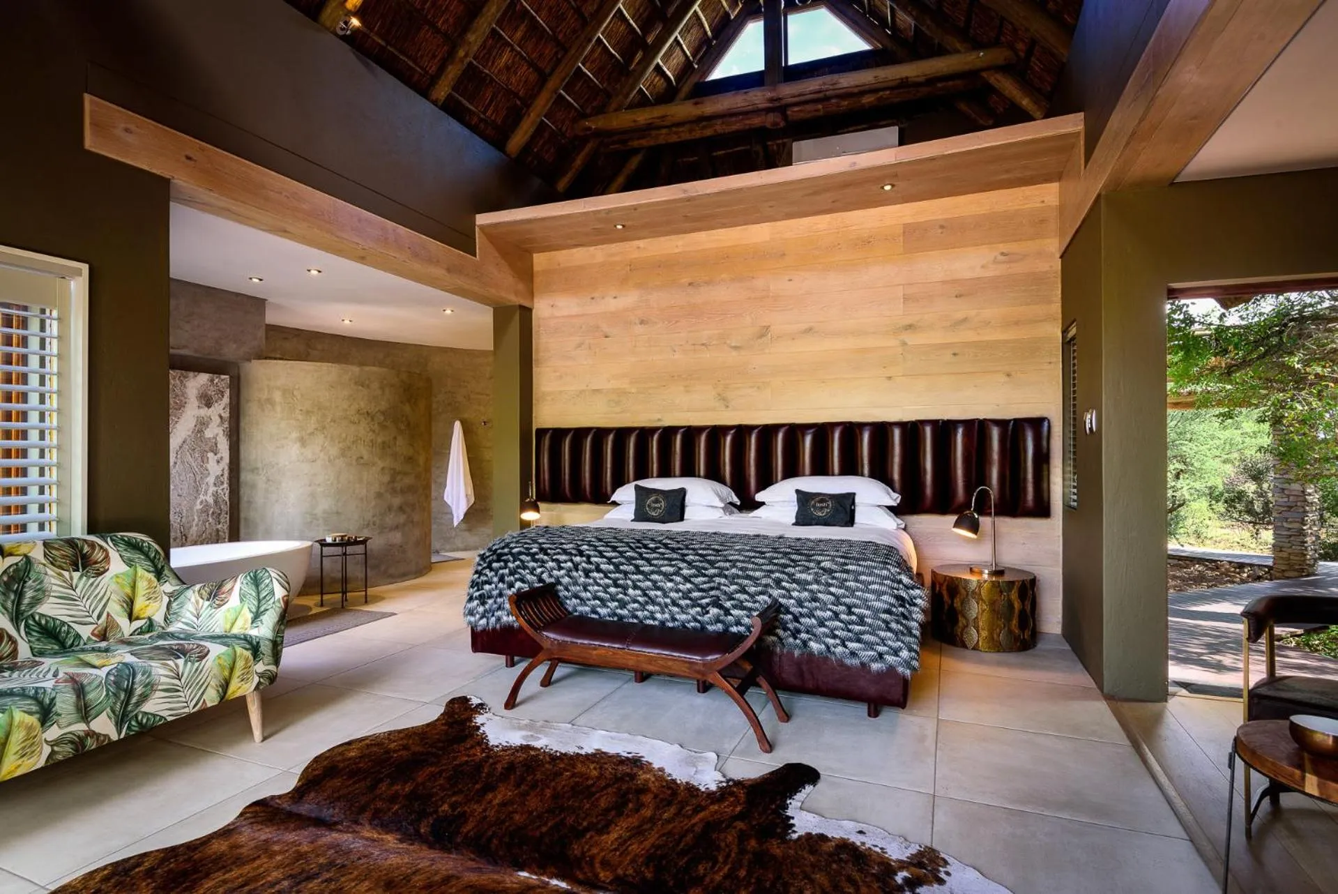Bed in Lush Private Game Lodge