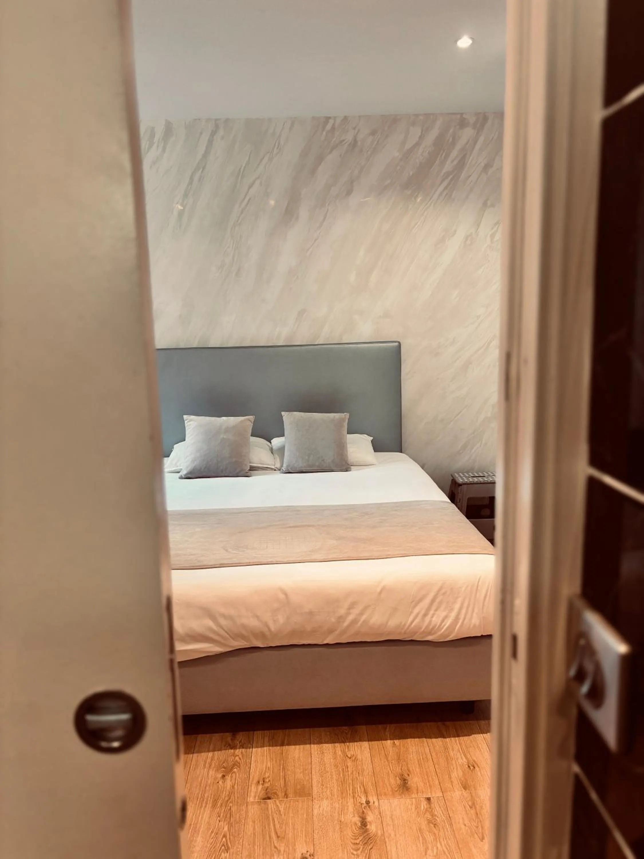 Bed in Logis Hôtel Saint Martin