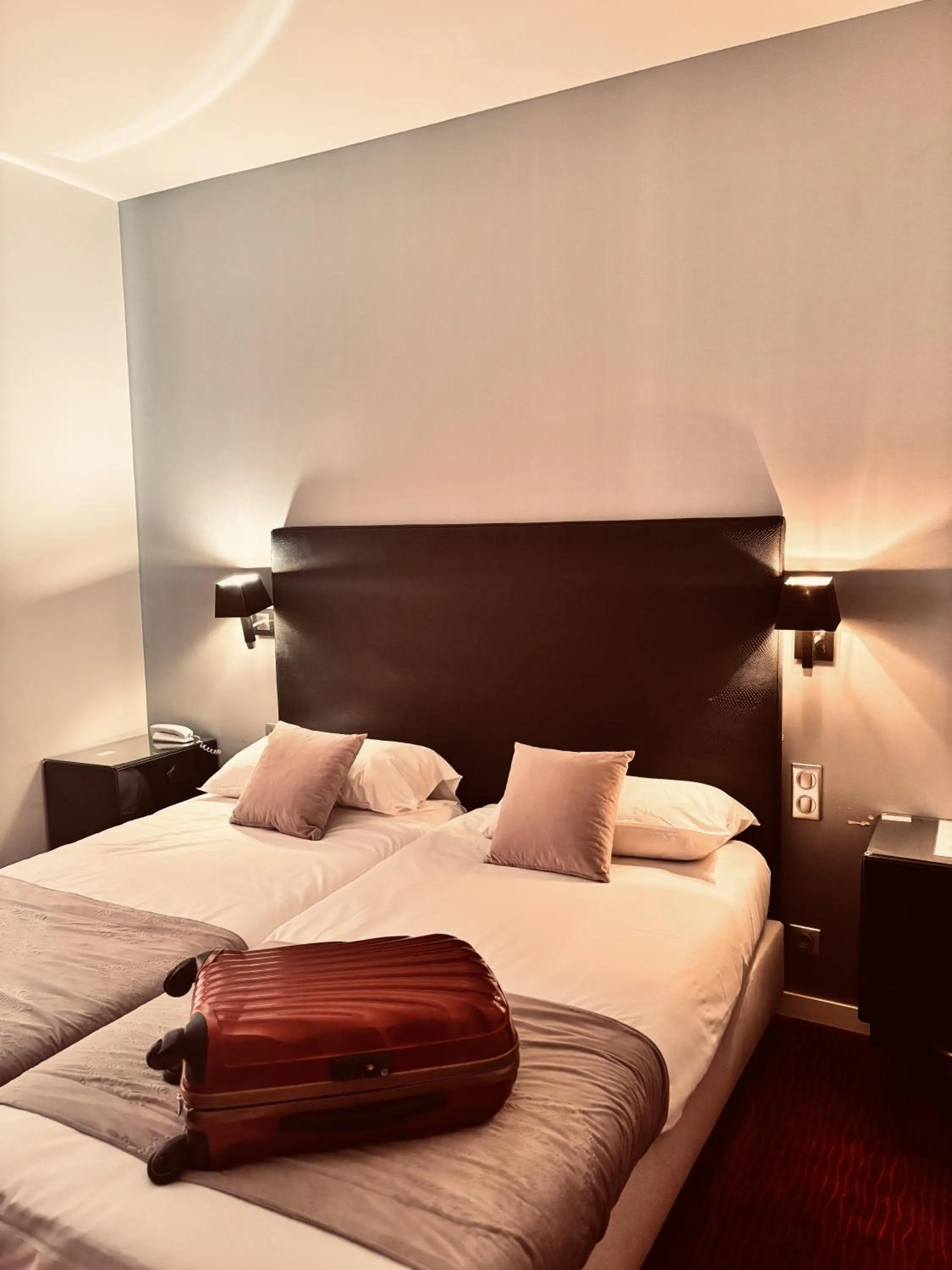 Bed in Logis Hôtel Saint Martin