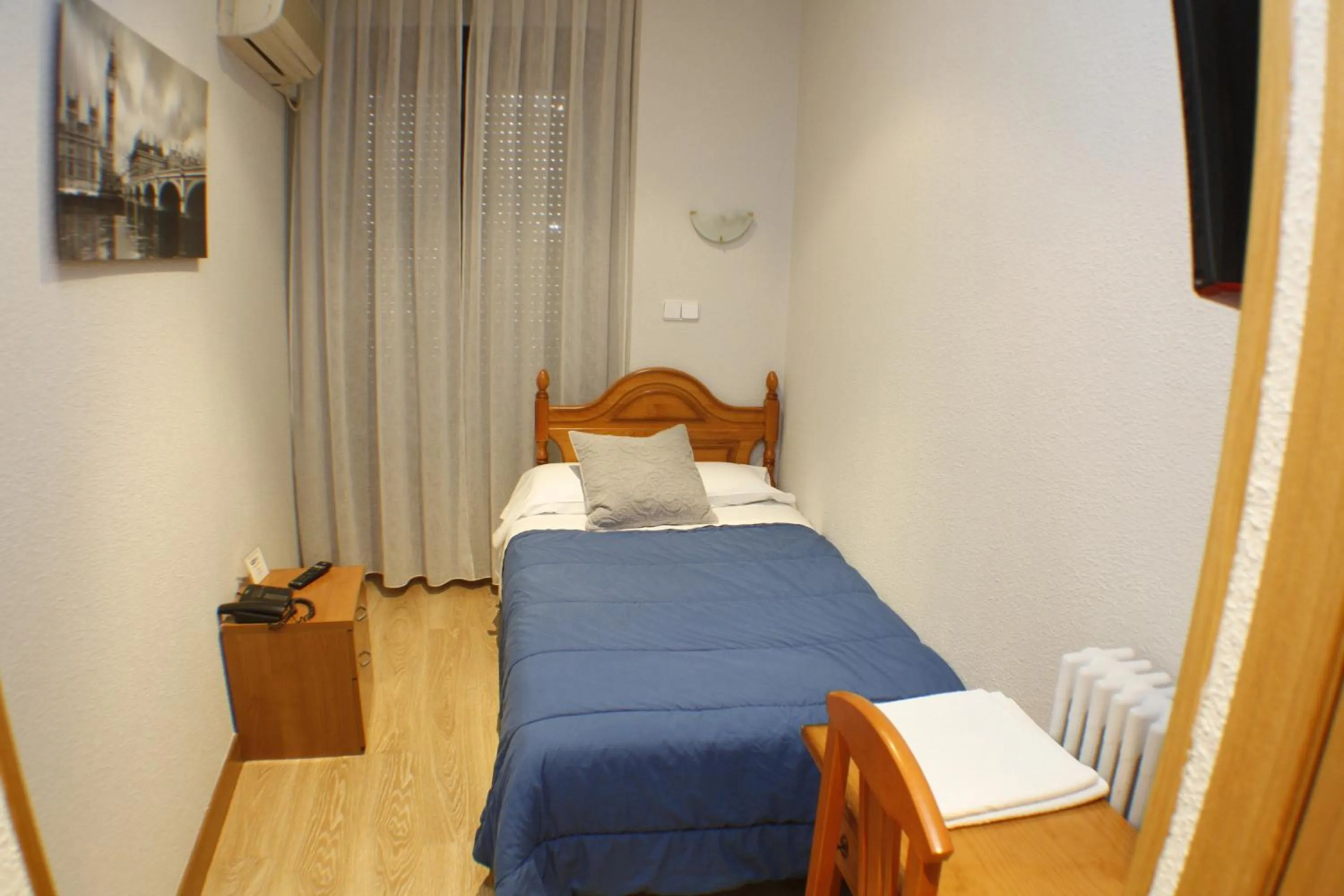 Photo of the whole room, Bed in Hostal Santa Cruz