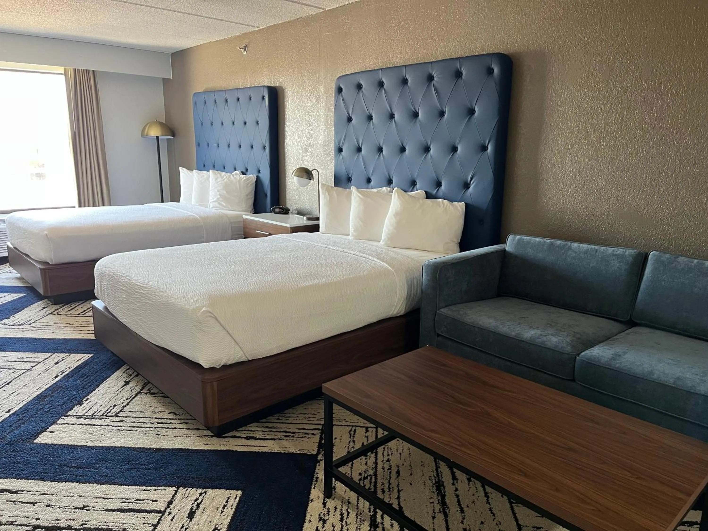 Photo of the whole room, Bed in Sky Point Hotel & Suites - Atlanta Airport