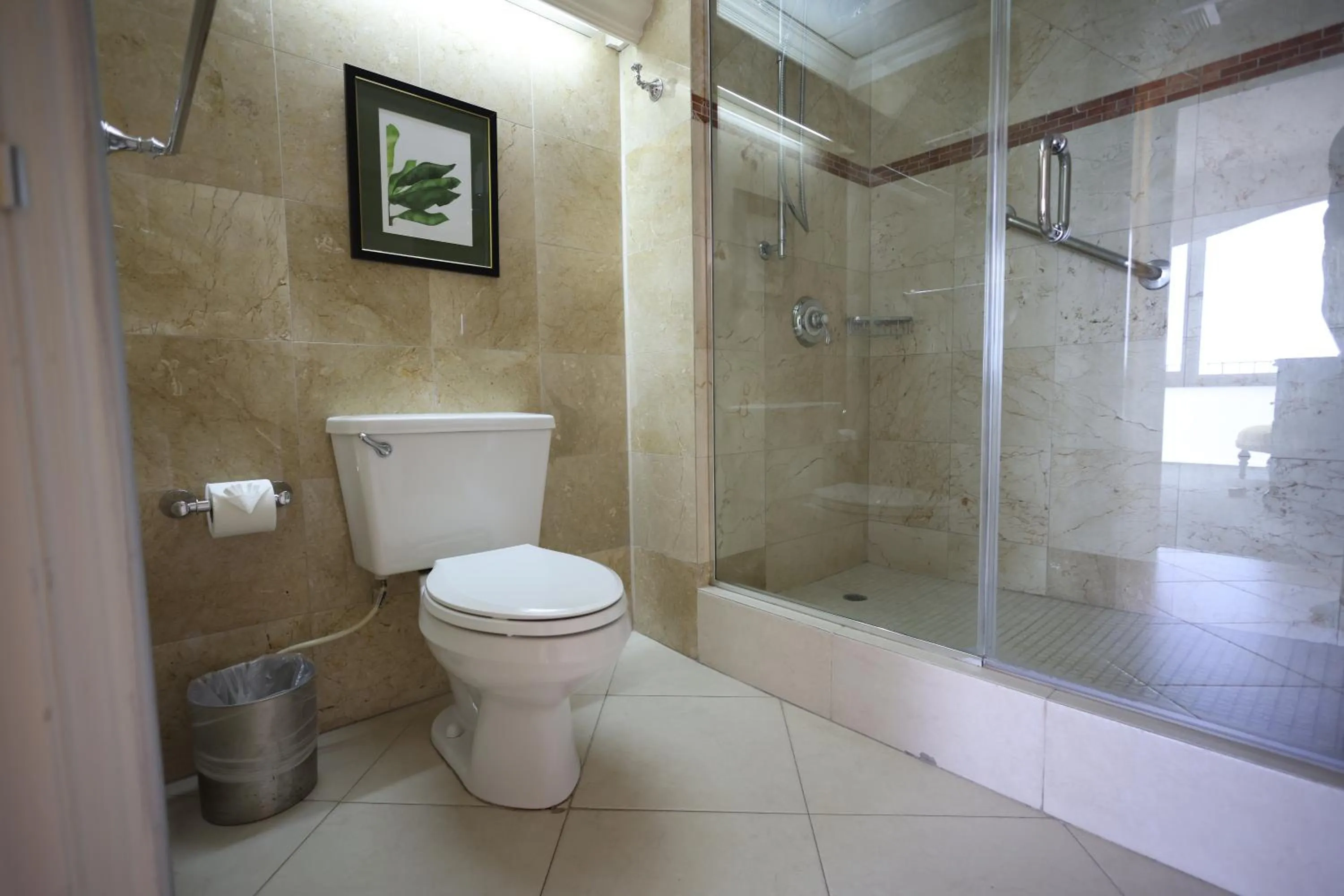 Bathroom in Courtleigh Hotel & Suites