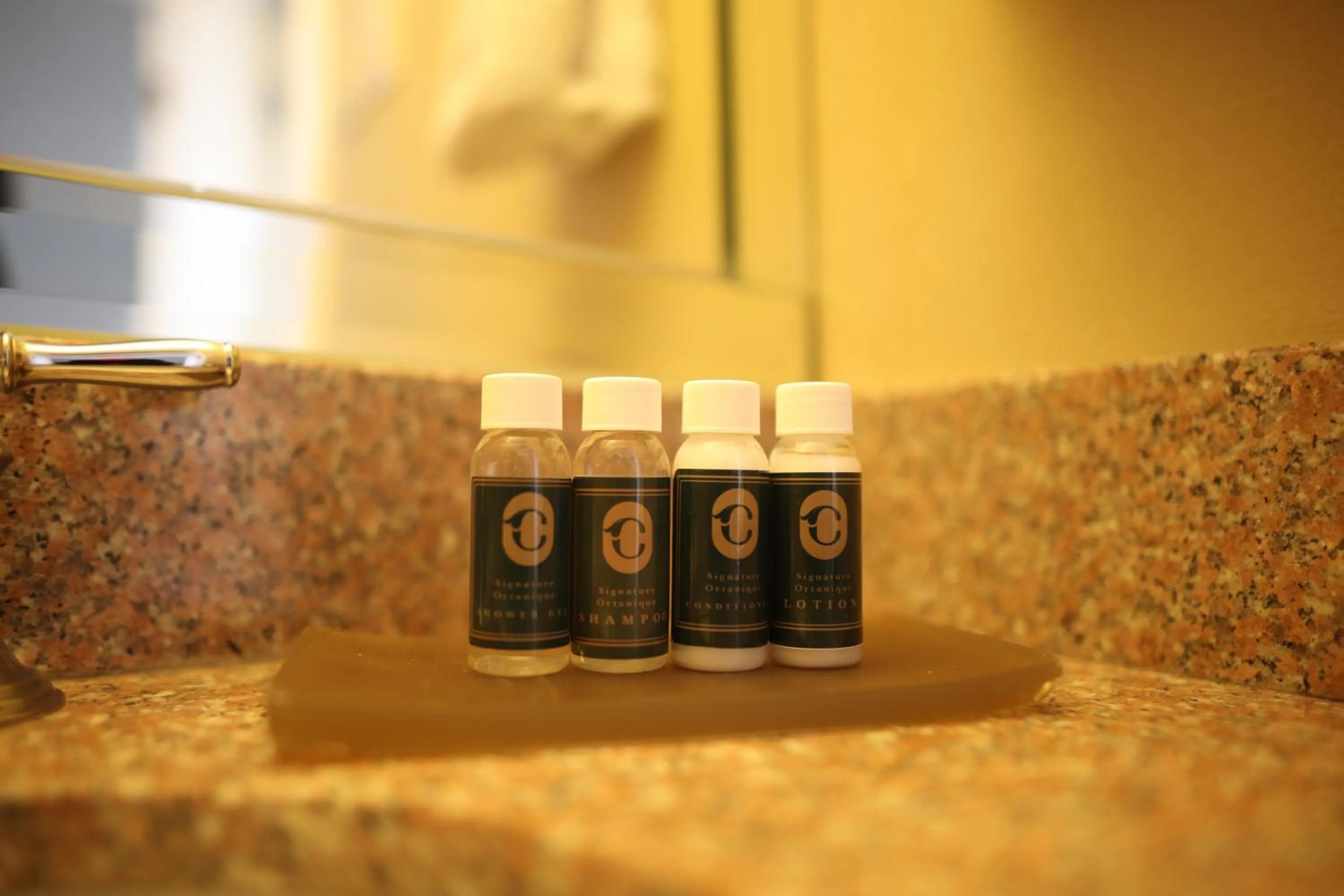 Bathroom in Courtleigh Hotel & Suites