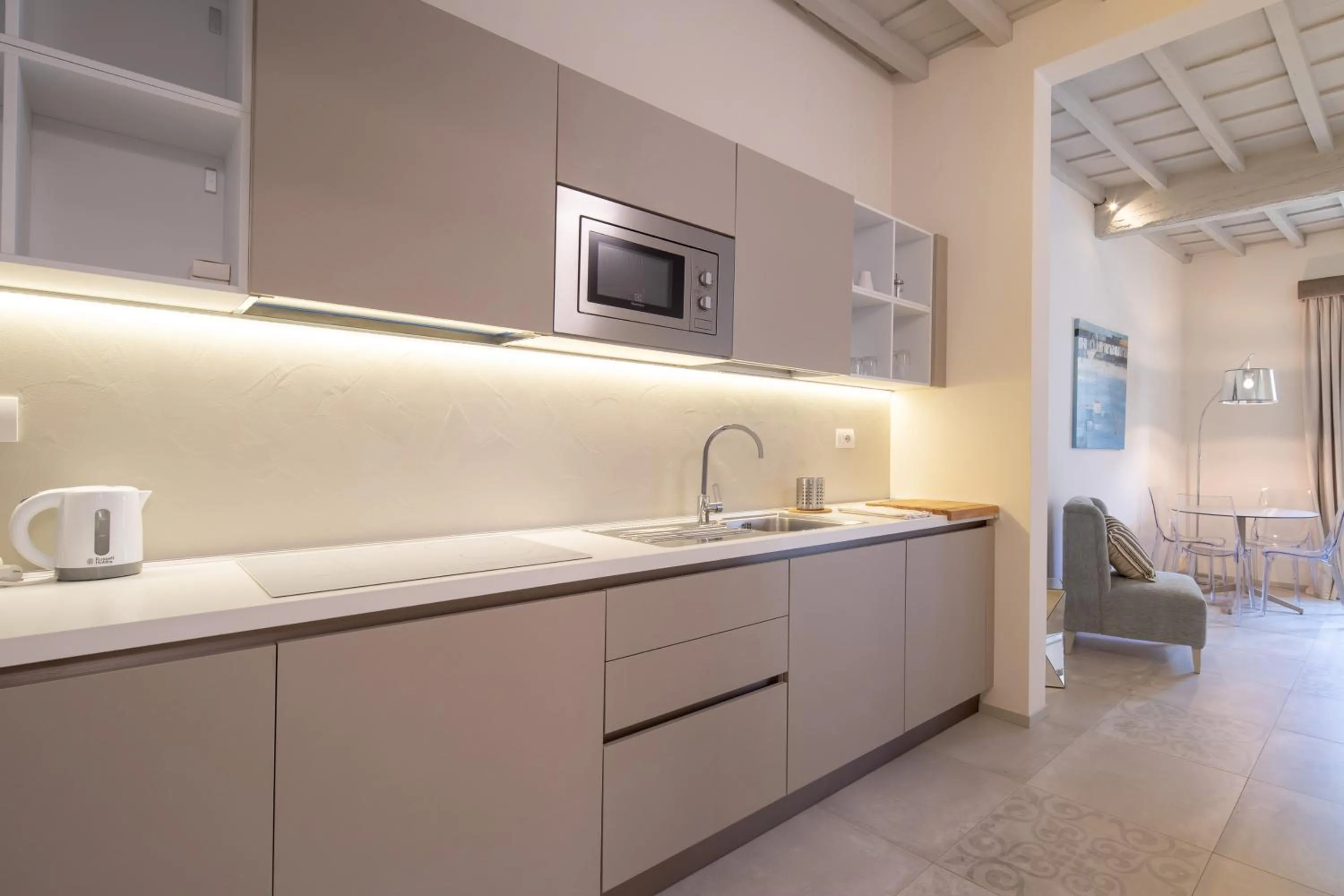 Kitchen or kitchenette in Carapelli Apartments