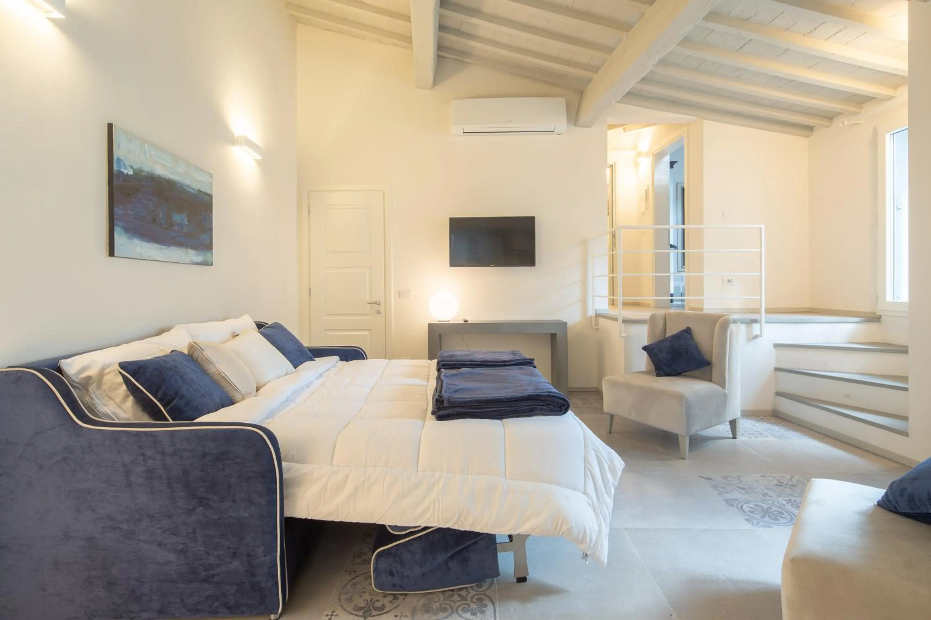 Living room, Bed in Carapelli Apartments