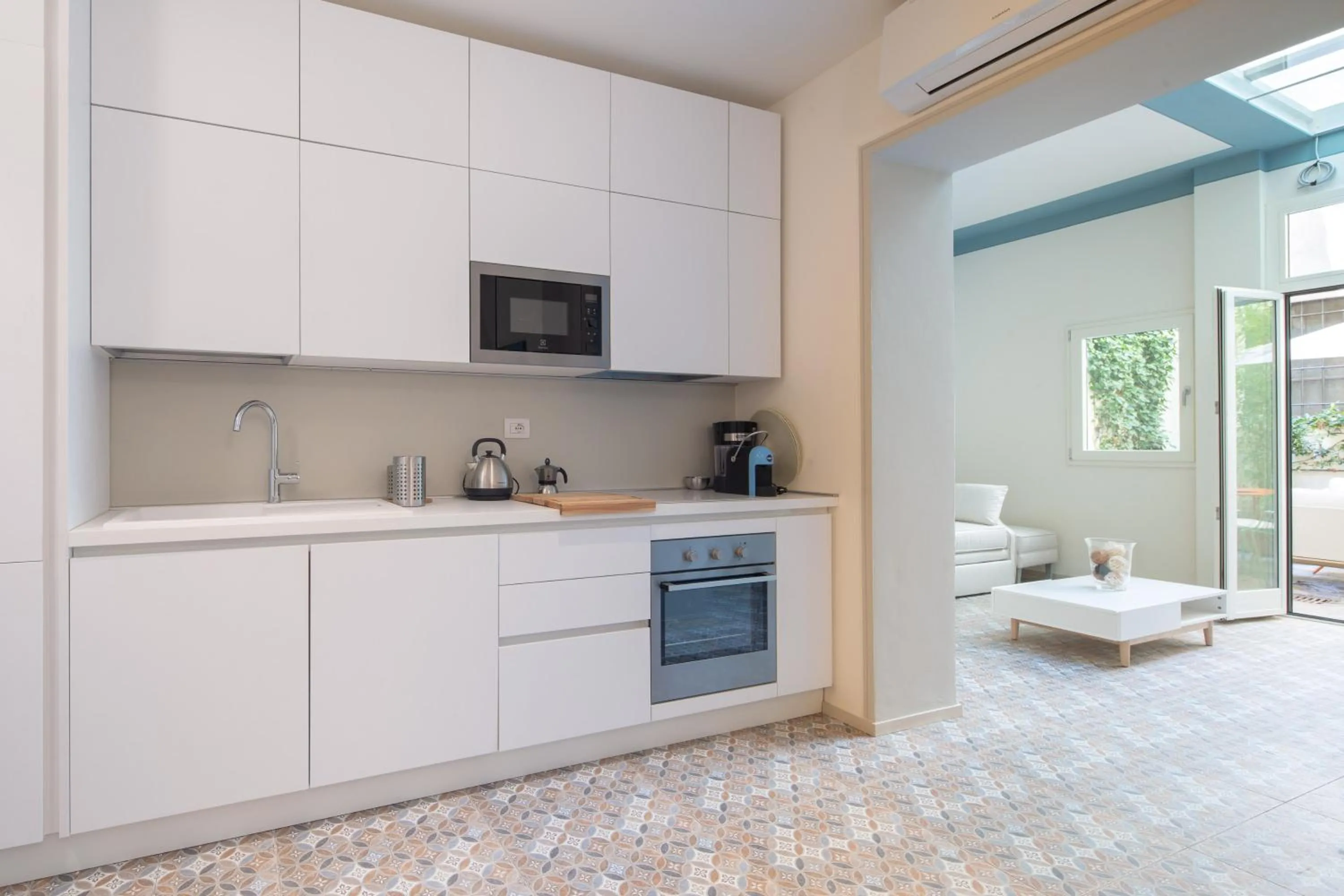 Kitchen or kitchenette in Carapelli Apartments