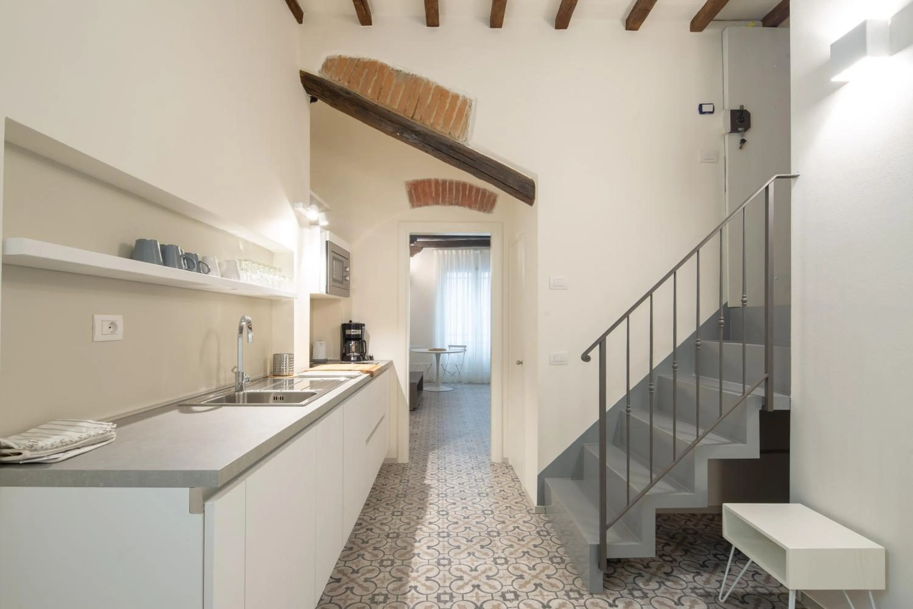 Kitchen or kitchenette in Carapelli Apartments