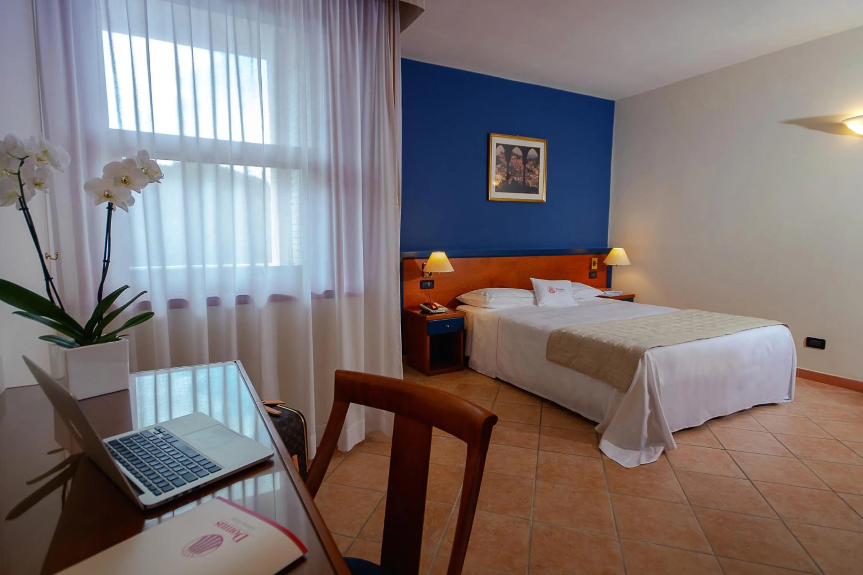 Bed in DOMUS Grand Hotel