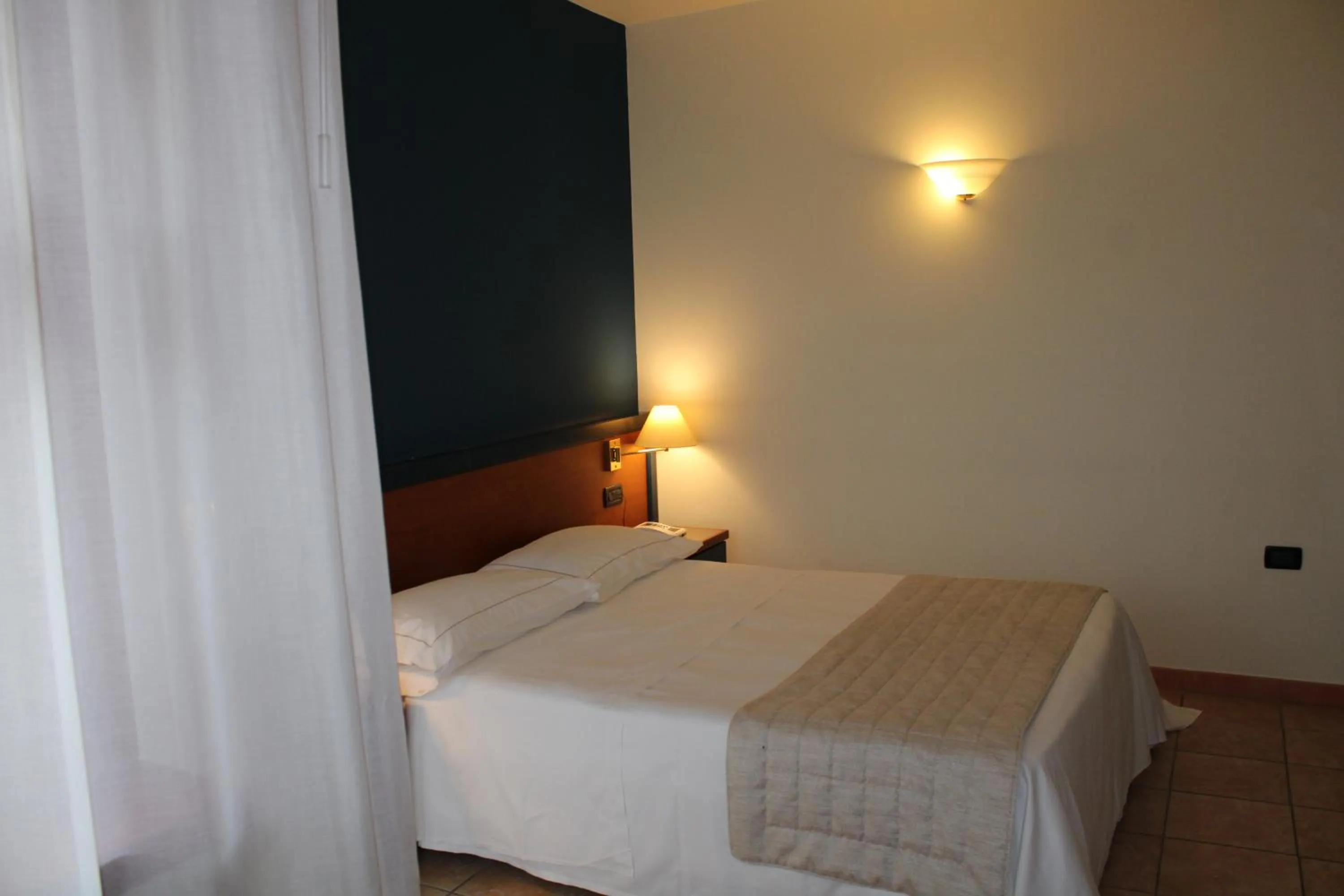 Bed in DOMUS Grand Hotel