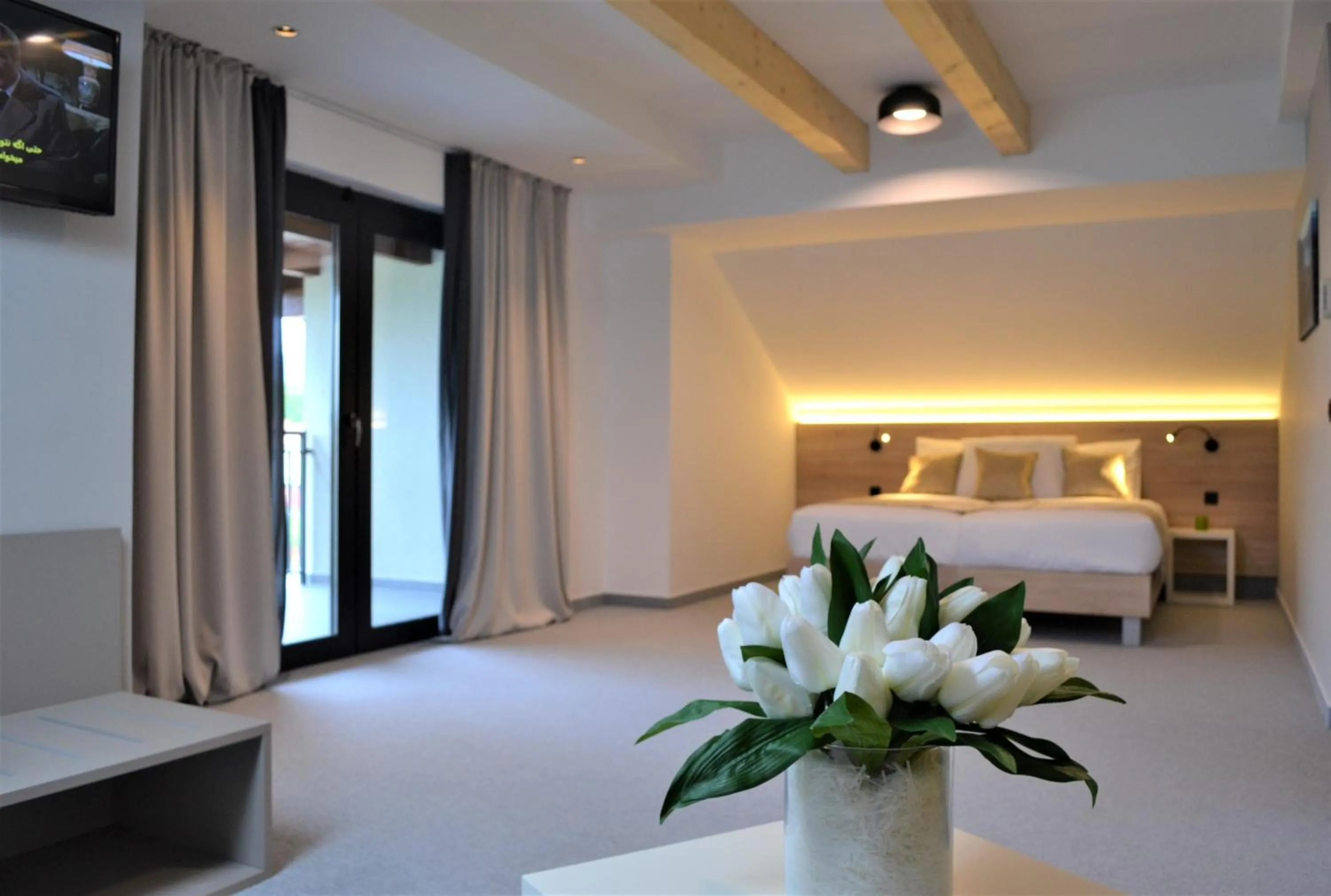 Bed in 16 Lakes Hotel