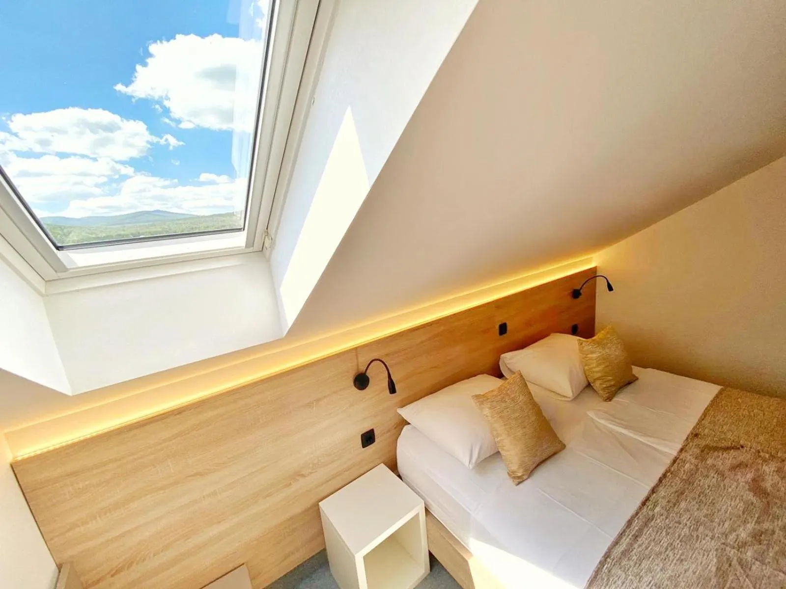 Bed in 16 Lakes Hotel