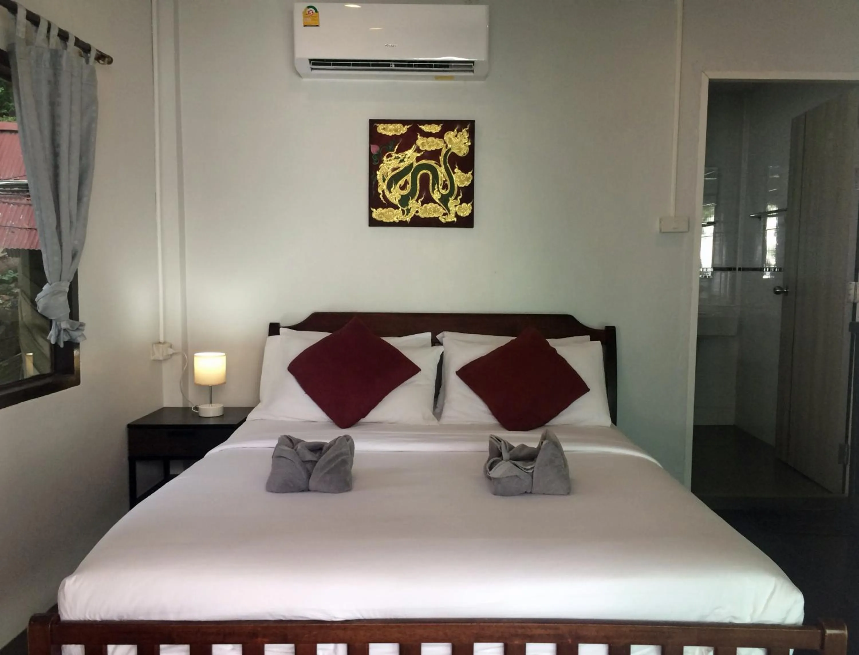 Bed in Sunrise Villas Seaview
