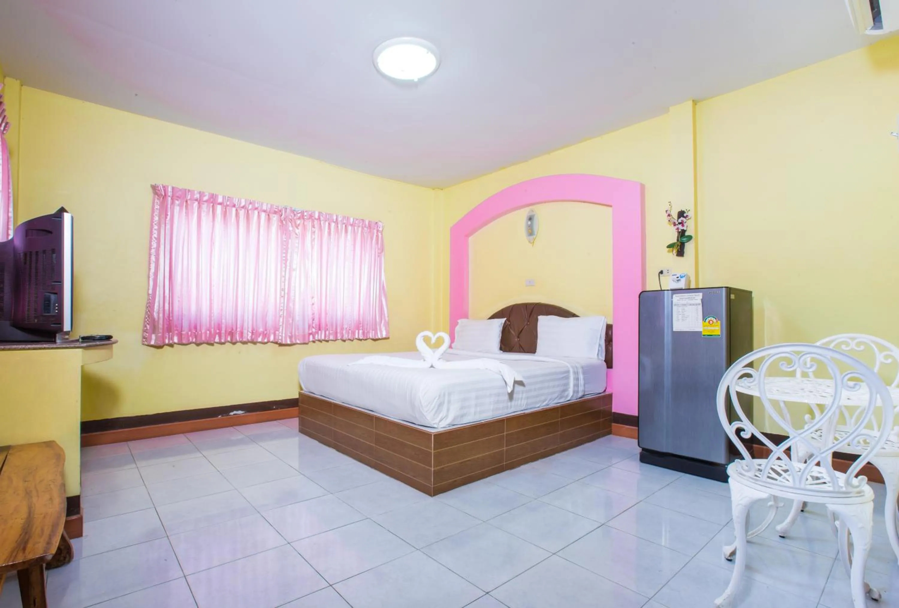 Bed in Jintana Resort