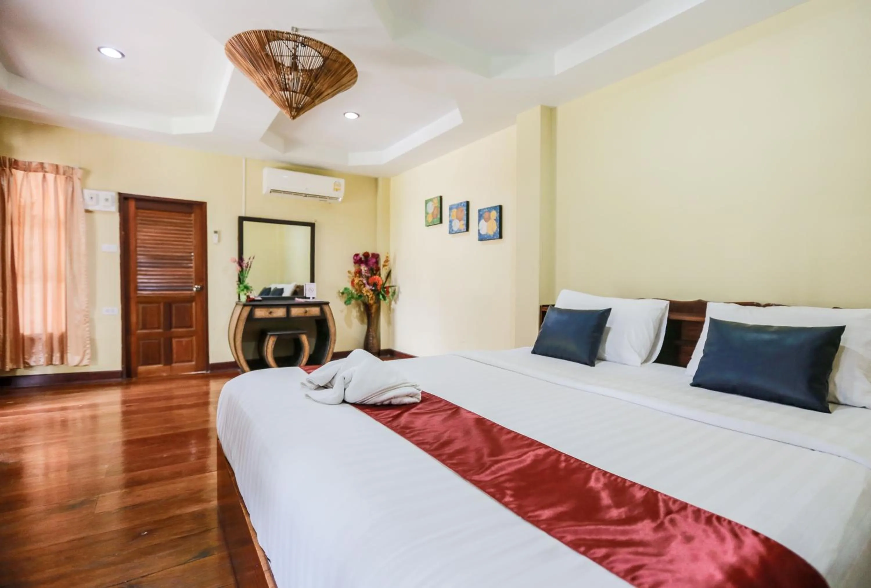 Bed in Jintana Resort