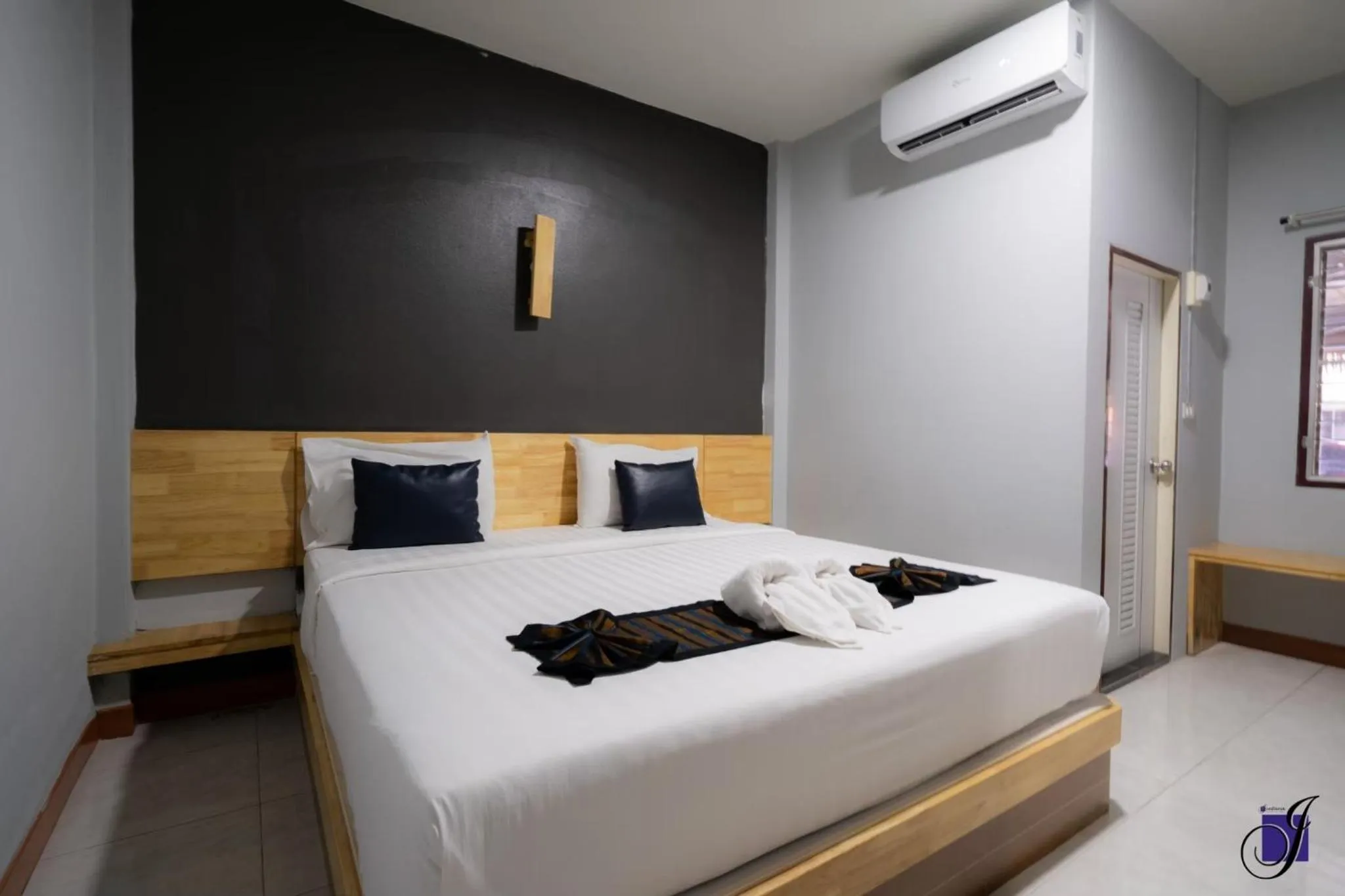 Bed in Jintana Resort