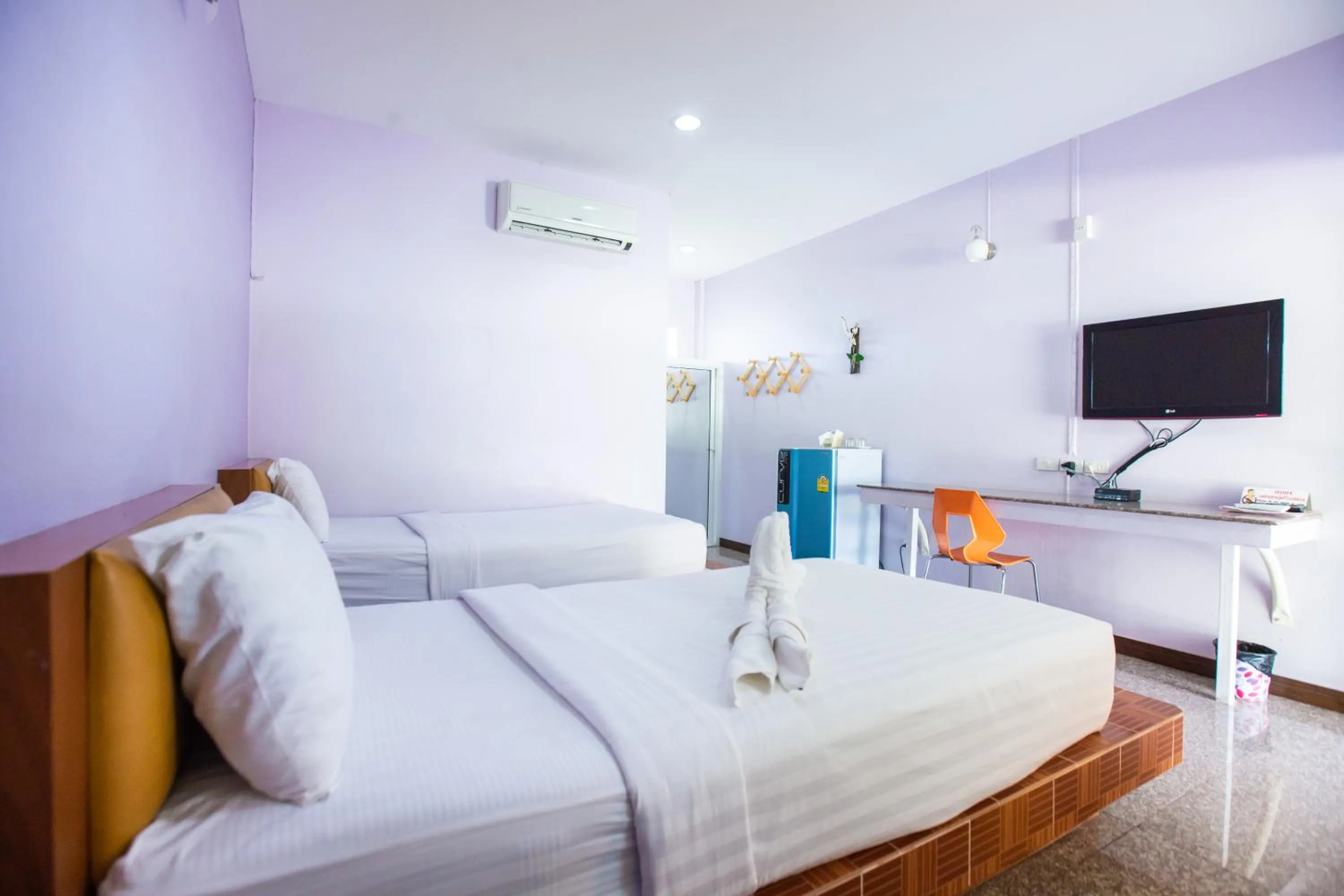 Bed in Jintana Resort