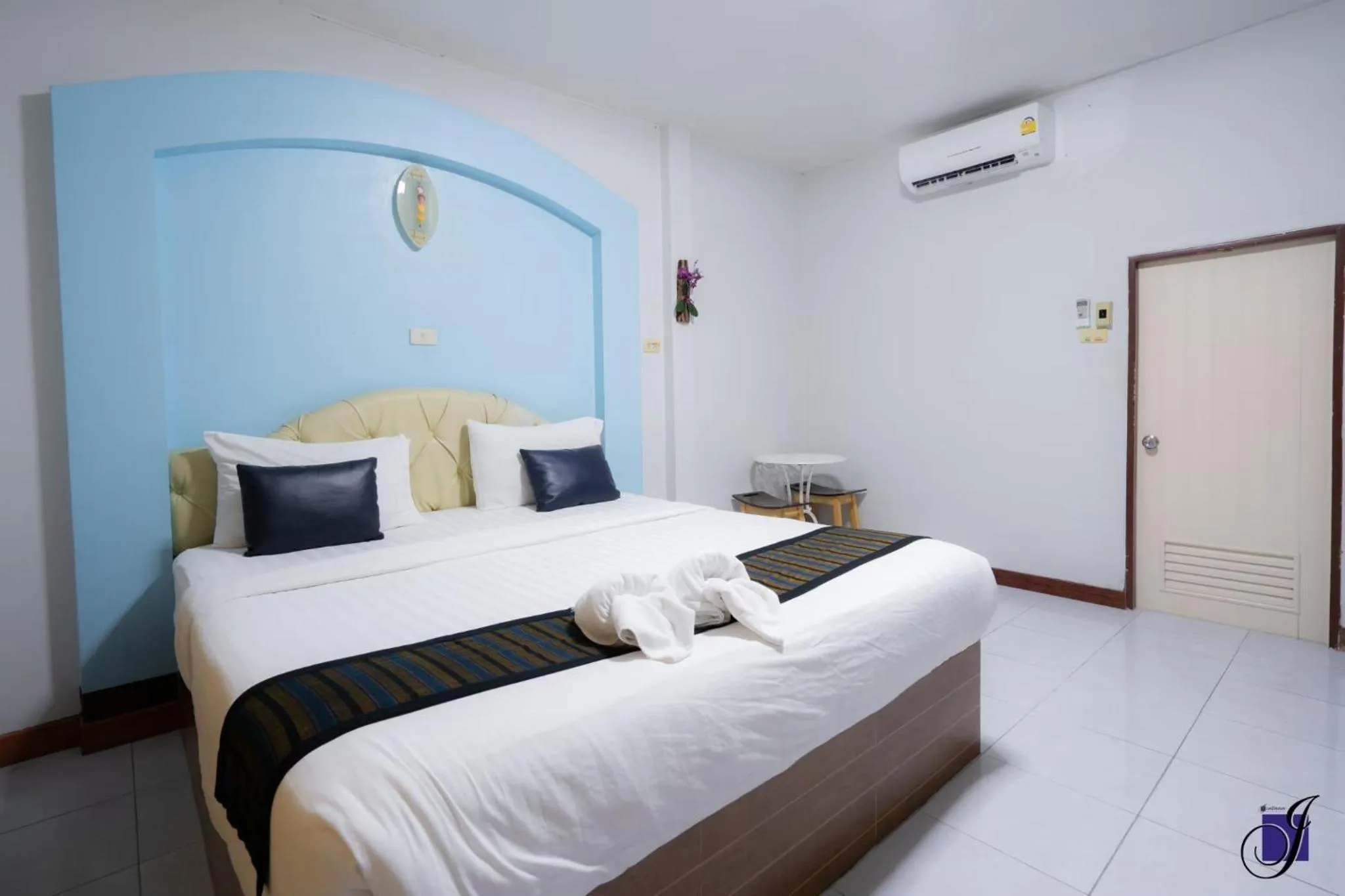 Bed in Jintana Resort