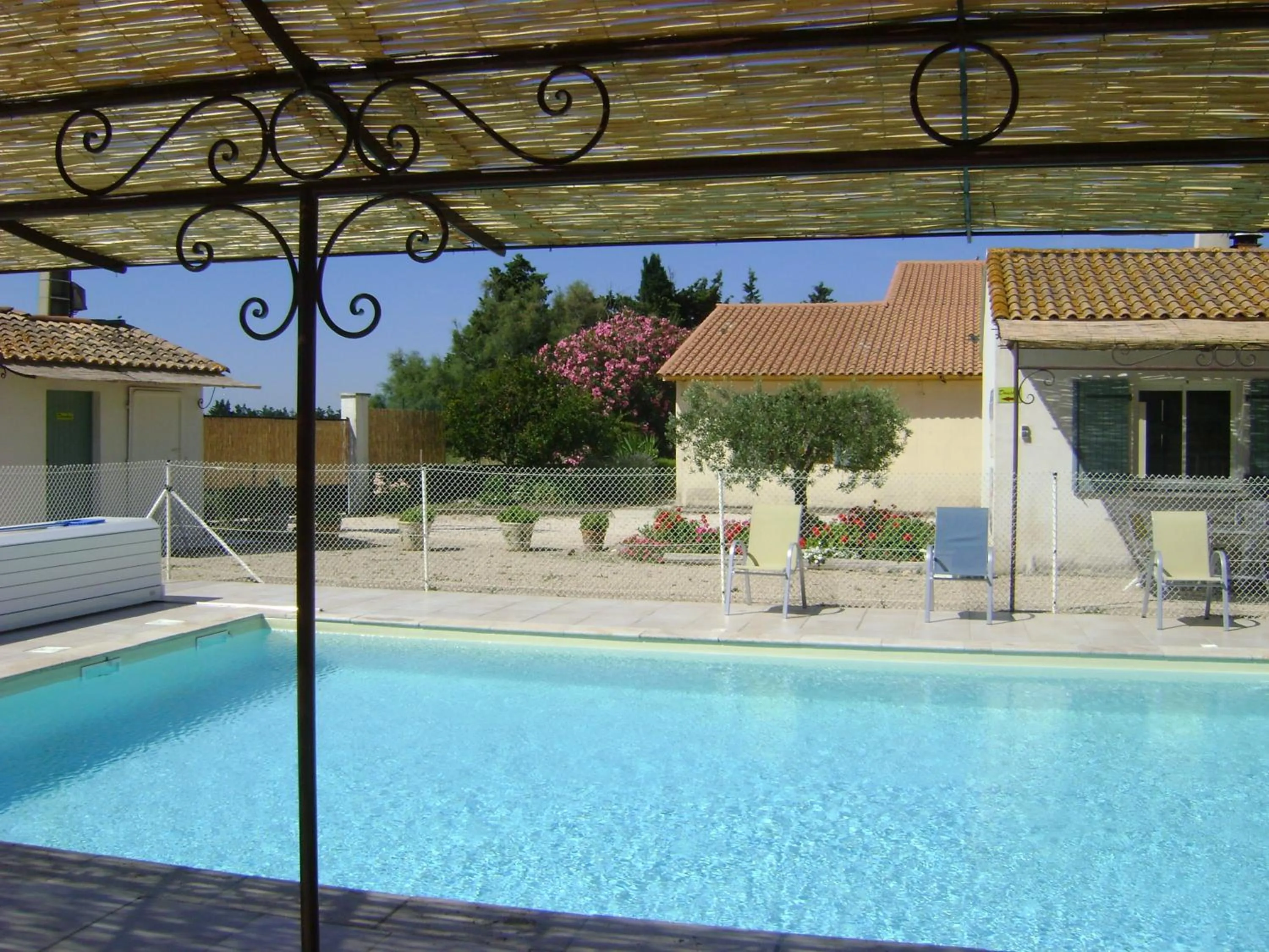Swimming pool in Logis Hotel des Granges
