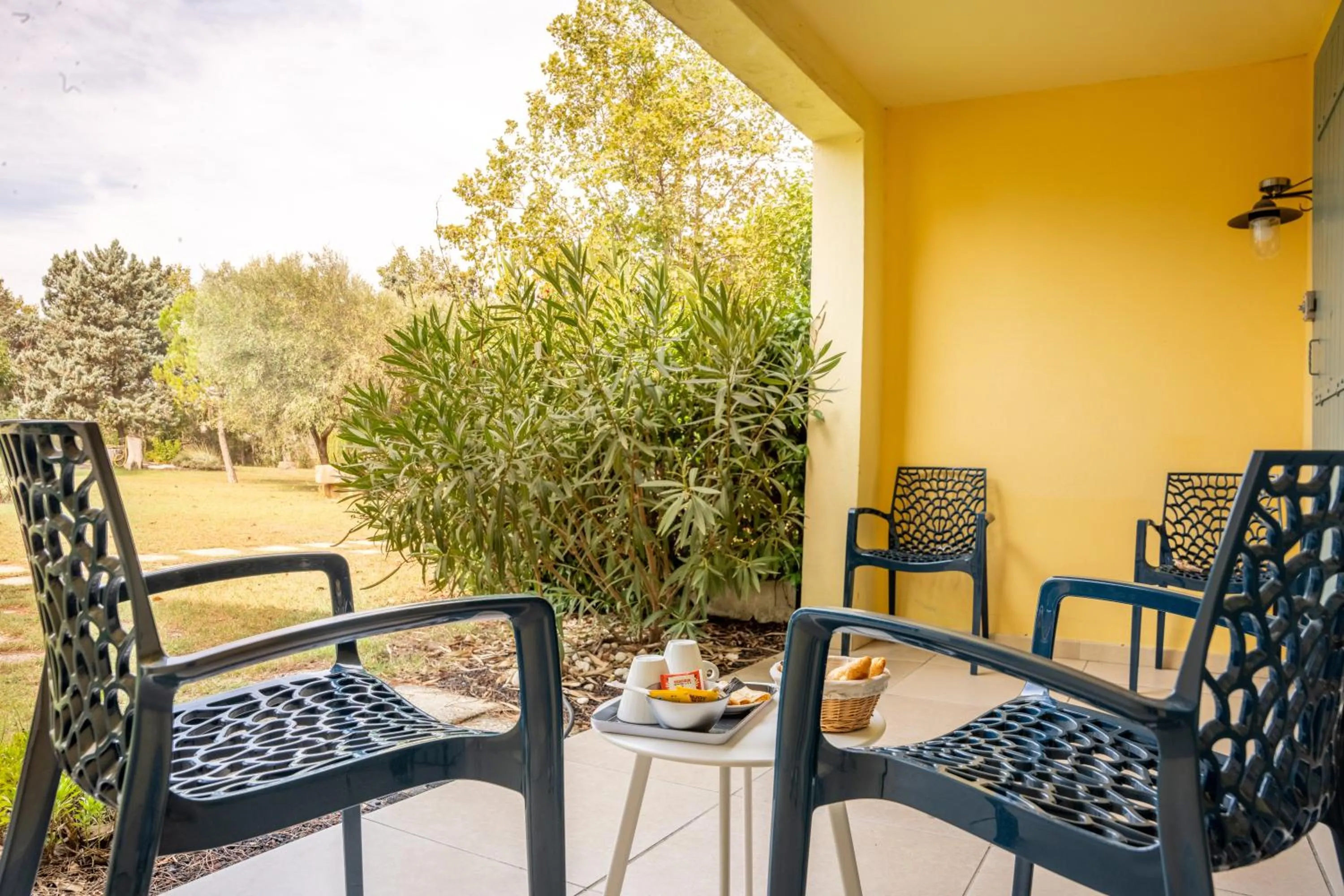 Patio in Logis Hotel des Granges