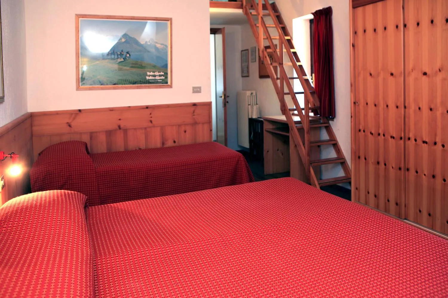 Bed in Albergo Le Marmotte