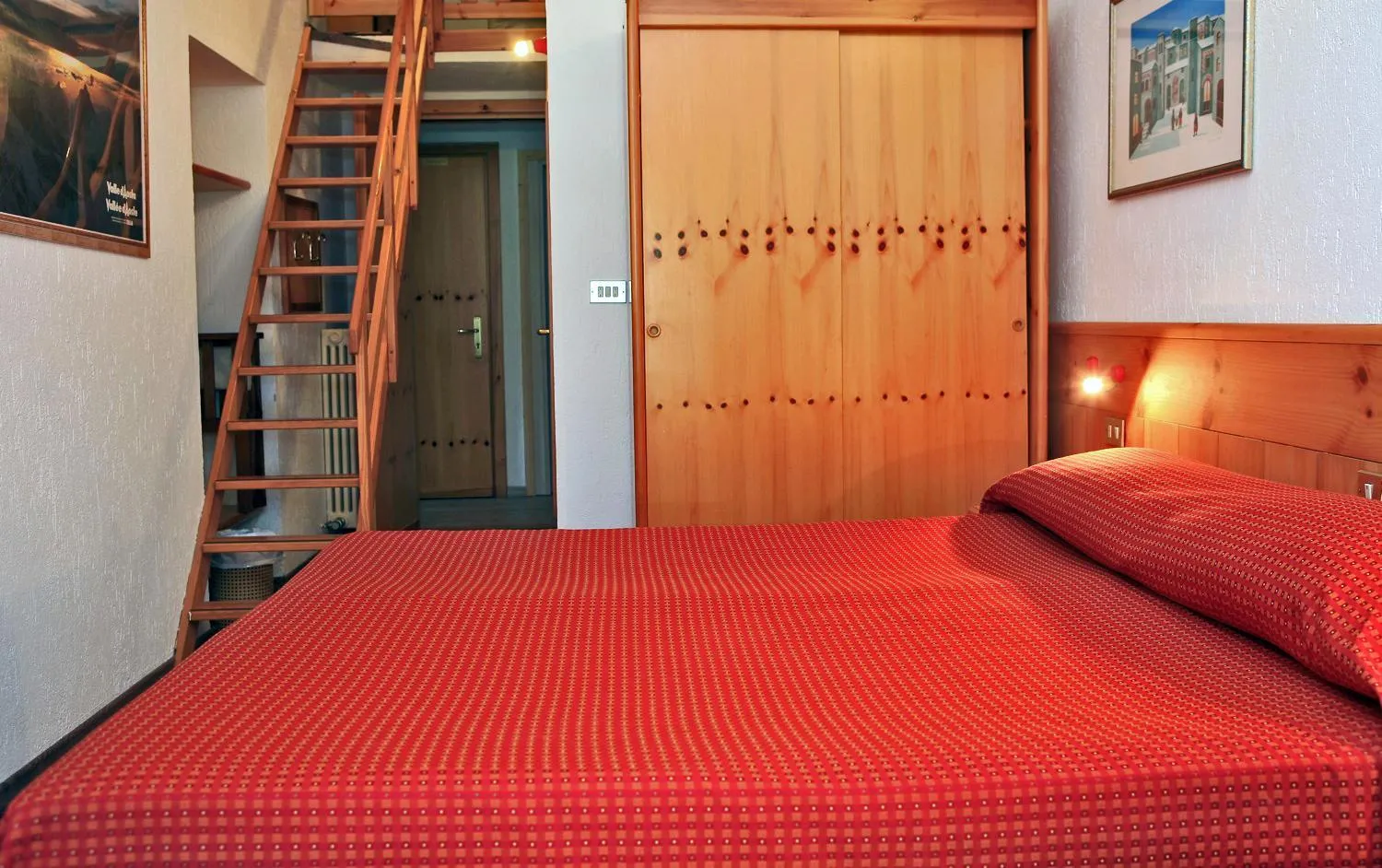 Bed in Albergo Le Marmotte