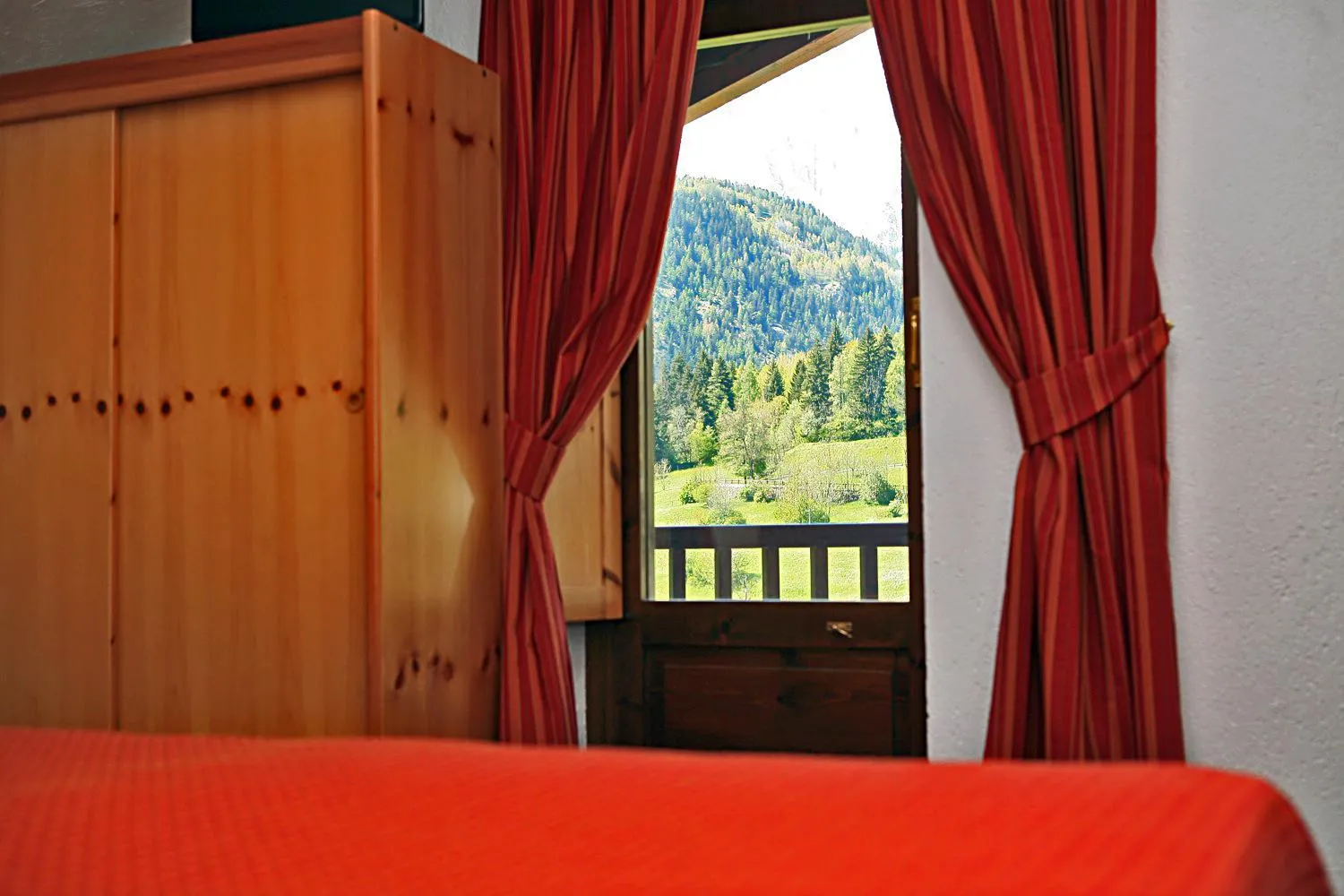 Bed in Albergo Le Marmotte