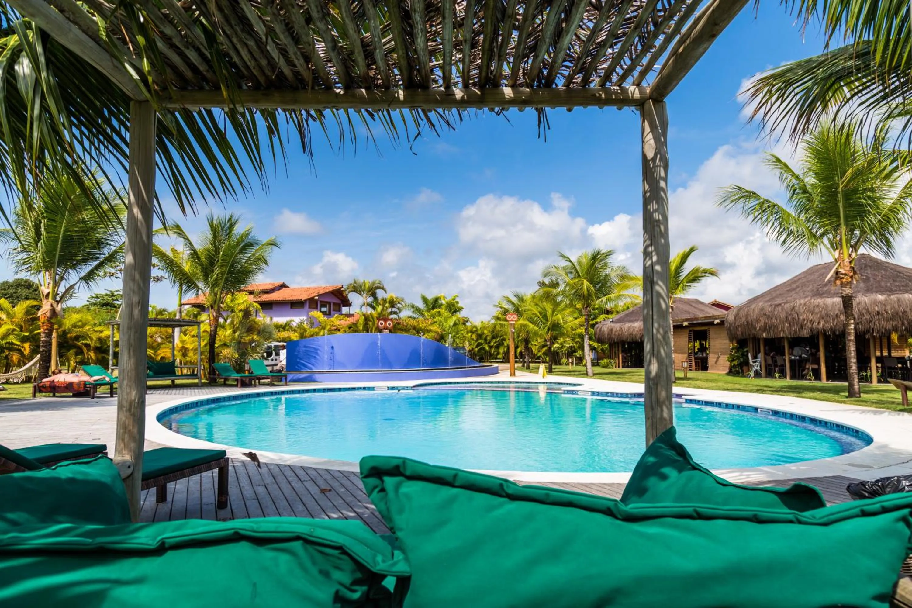Pool view in Toko Village Casa de Férias