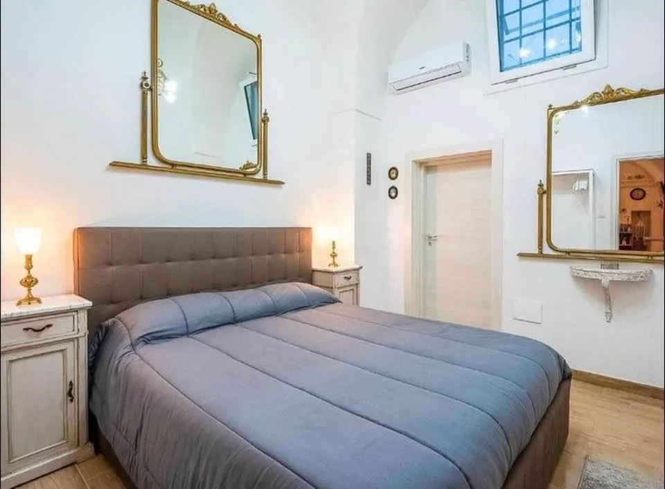 Bed in Dimora luxury Santa Lucia Apartaments