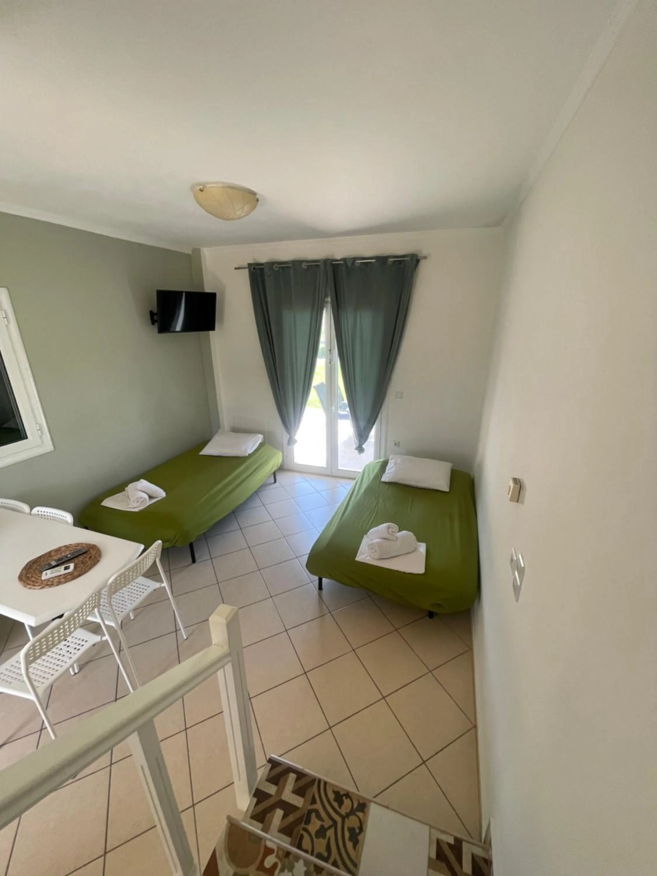 Seating area in Mythos apts rentit