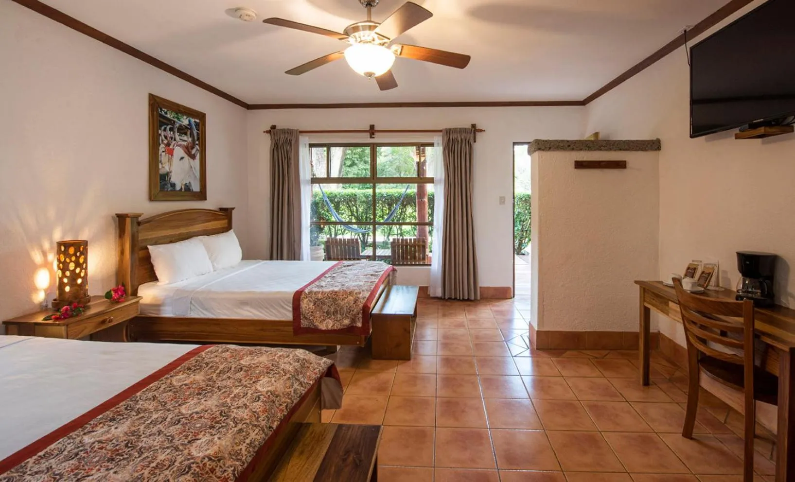 Photo of the whole room, Bed in Hacienda Guachipelin Volcano Ranch Hotel & Hot Springs