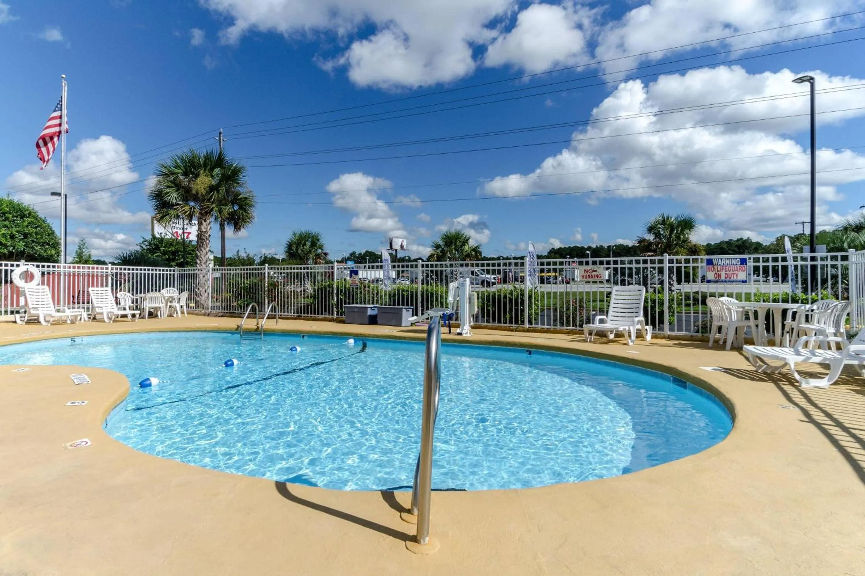Swimming pool in Rodeway Inn & Suites Jacksonville near Camp Lejeune