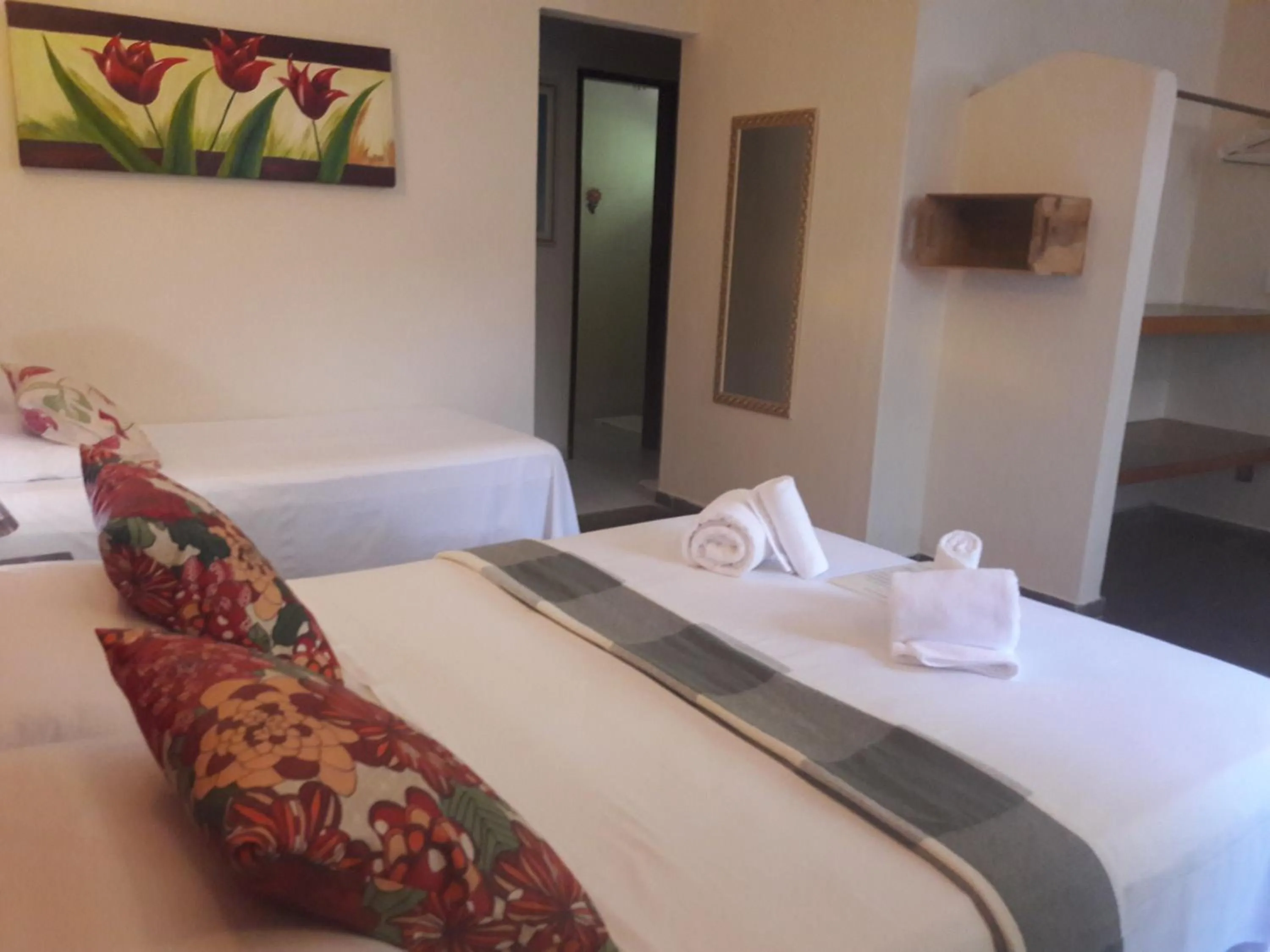 Bed in Pousada Macunaima