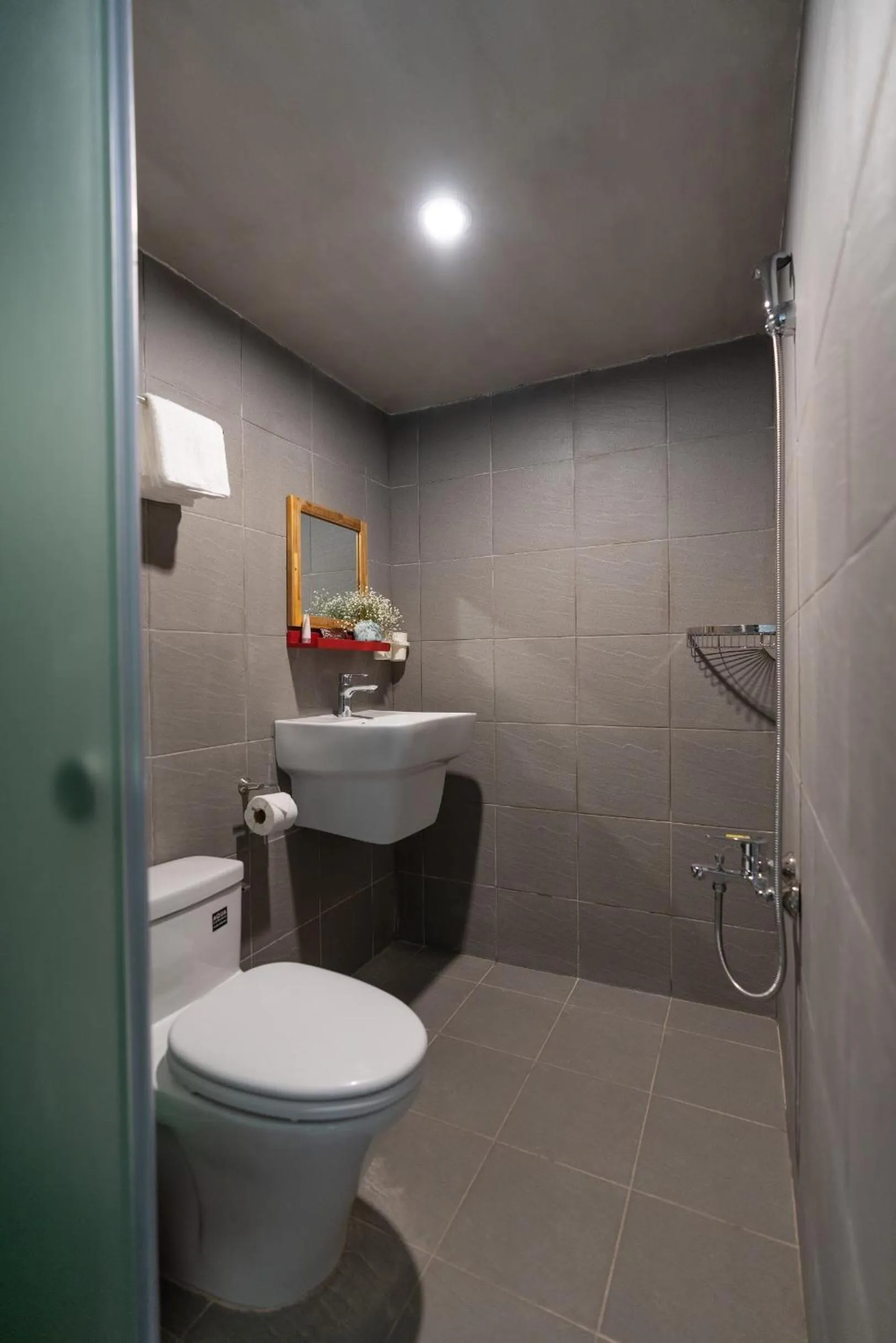 Toilet in 9 Hostel and Bar