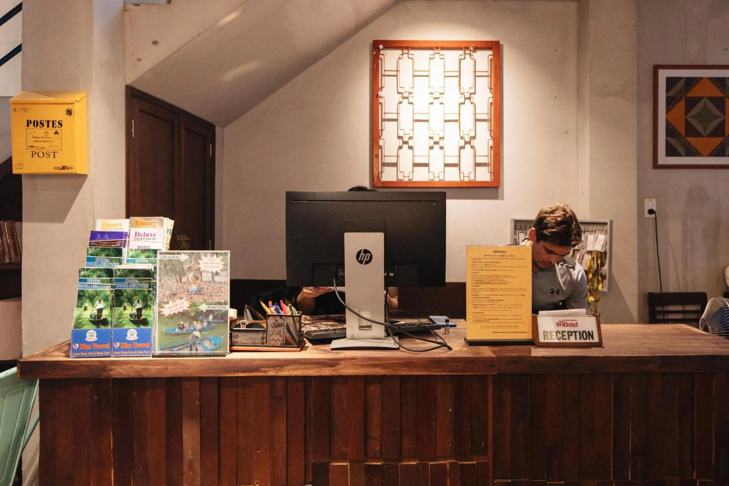 Property logo or sign in 9 Hostel and Bar