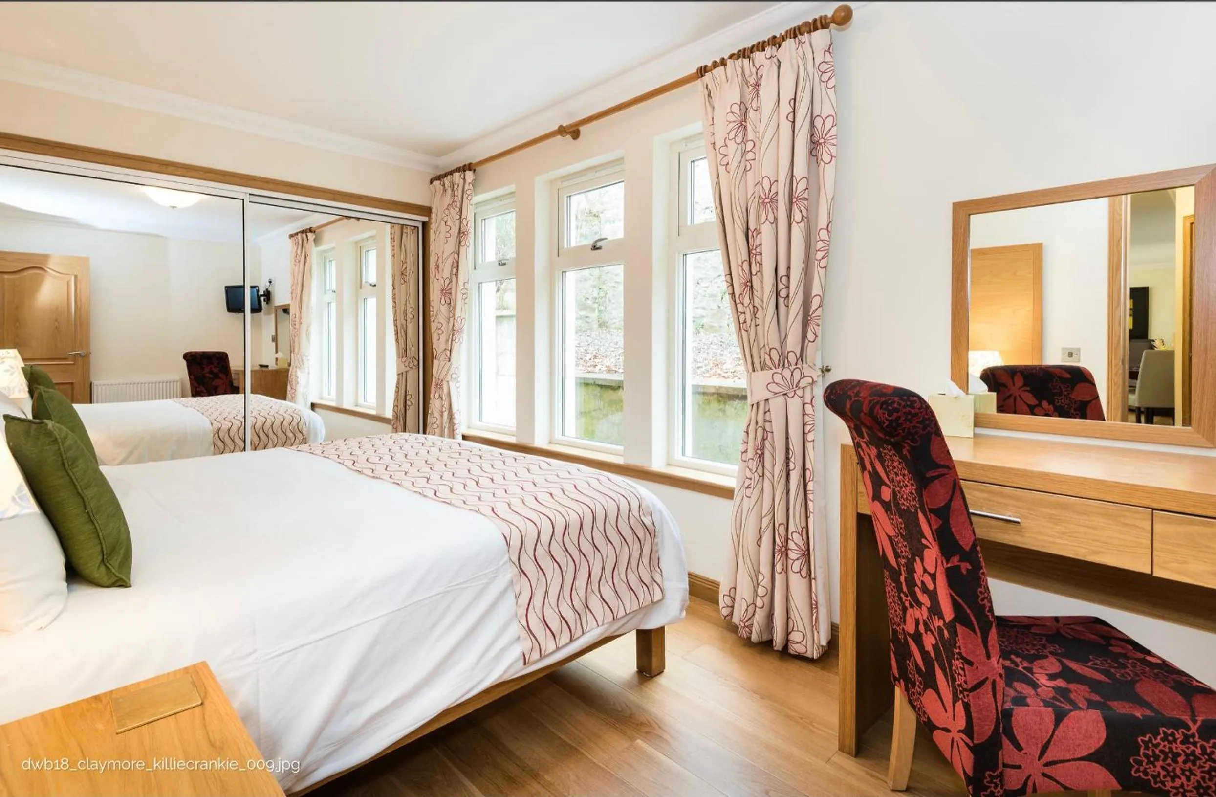 Bed in The Claymore Guest House