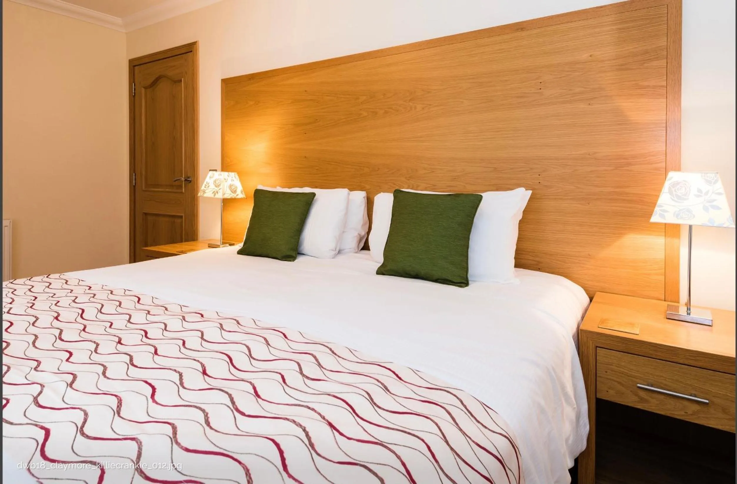 Bed in The Claymore Guest House