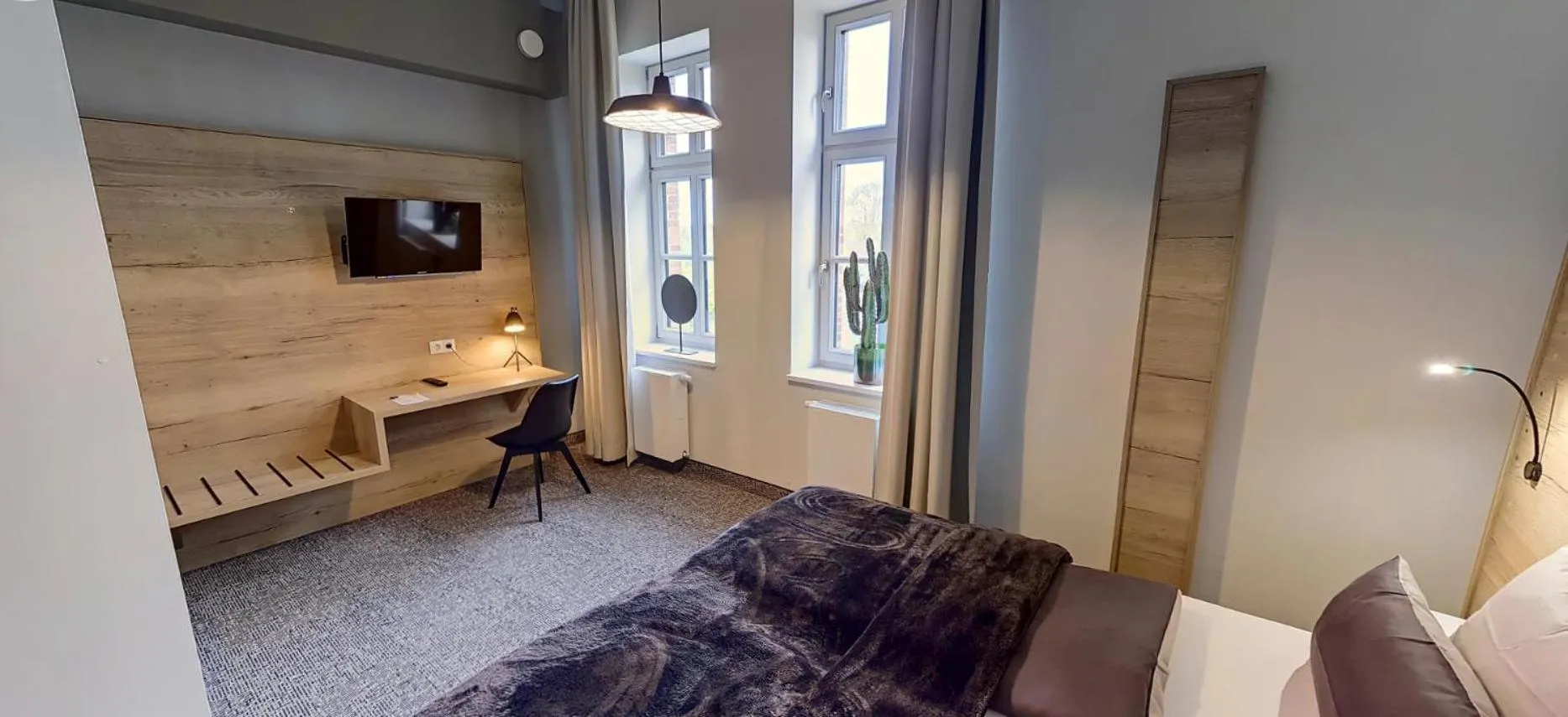 Seating area, Bed in Boardinghouse Emden