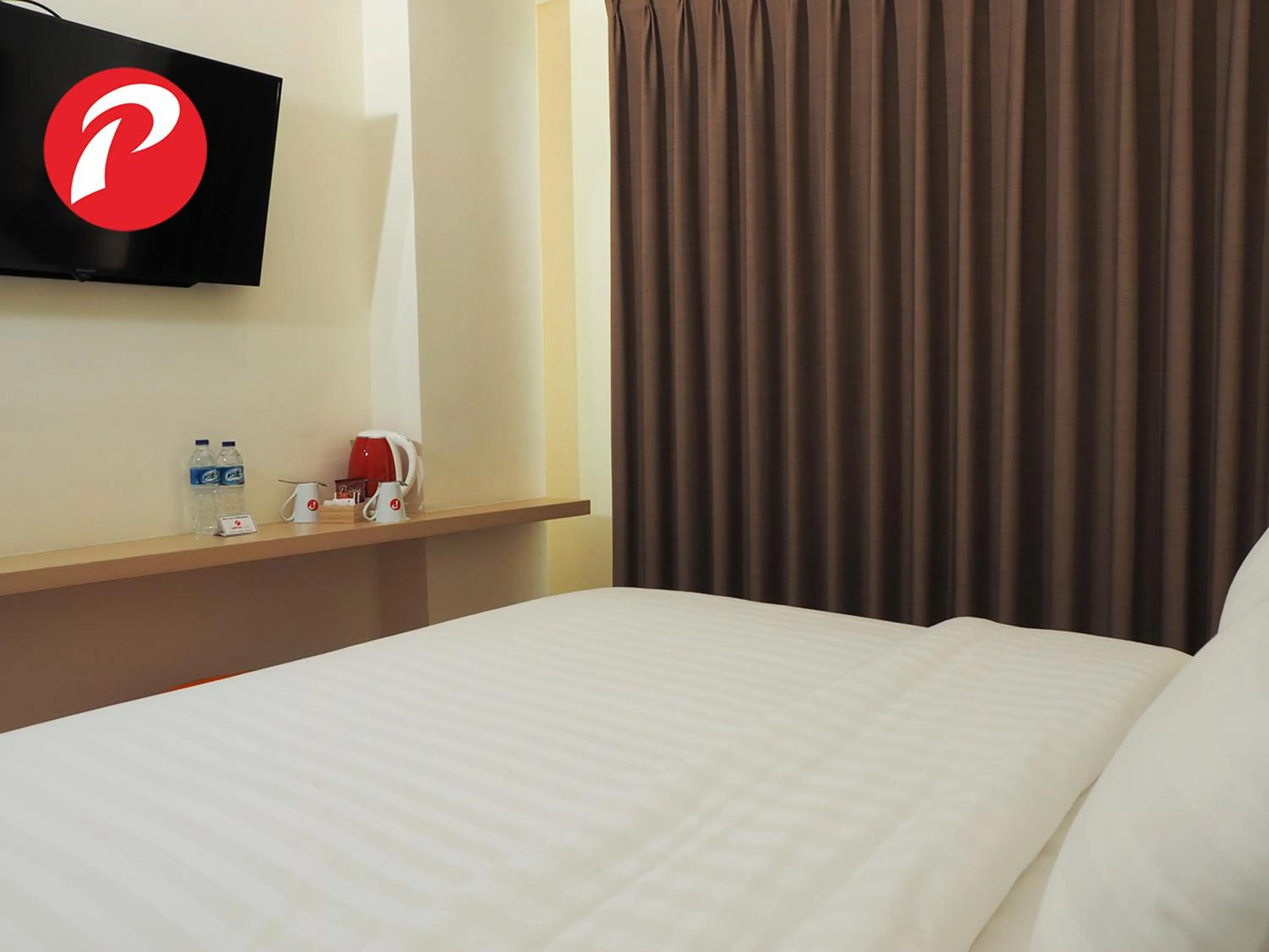 Bed in d'primahotel Airport Jakarta 2