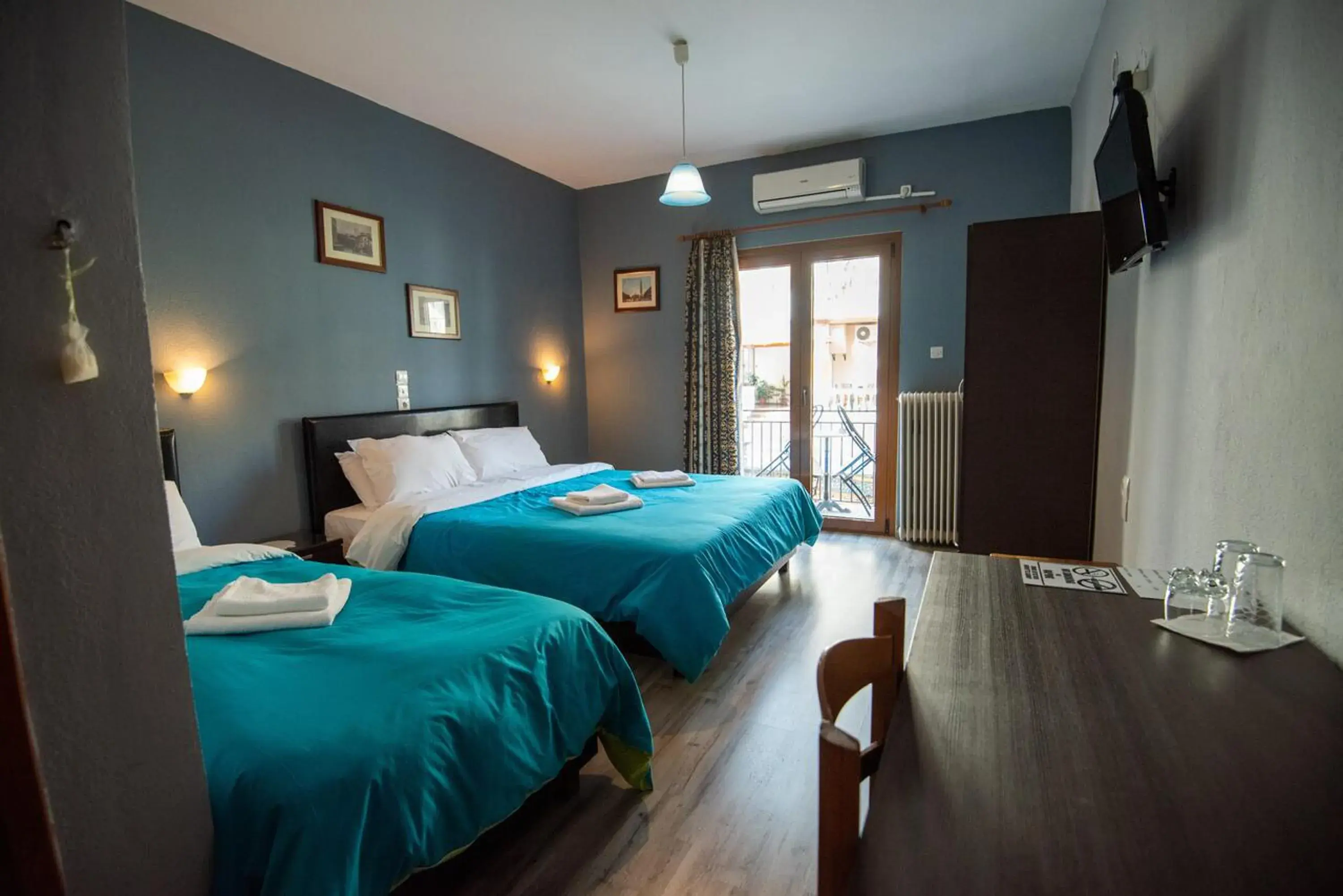 Deluxe Triple Room in Domus Inn Deluxe Triple Room in Domus Inn