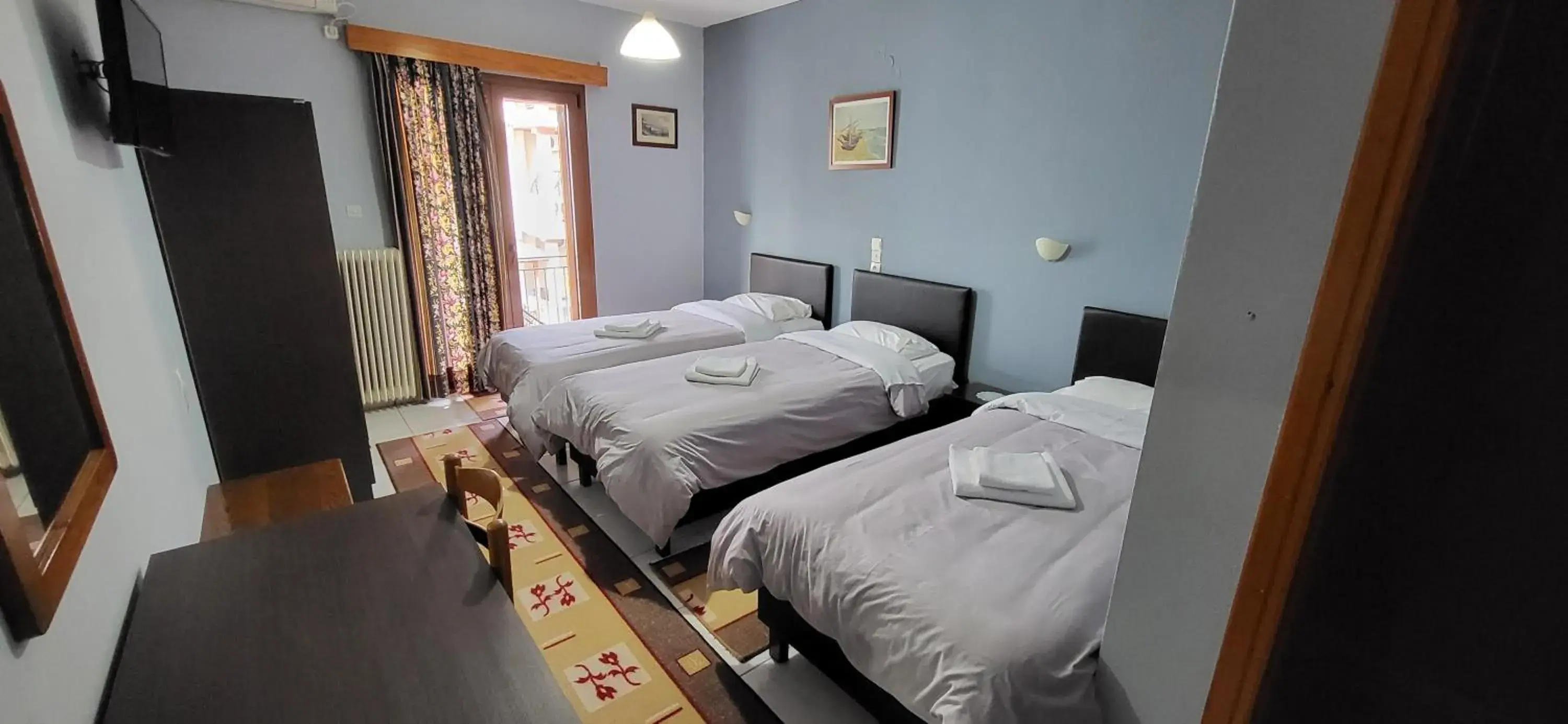 Triple Room in Domus Inn Triple Room in Domus Inn