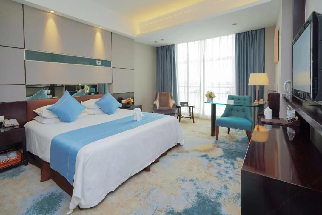 Bed in Royal Palace Hotel Haining