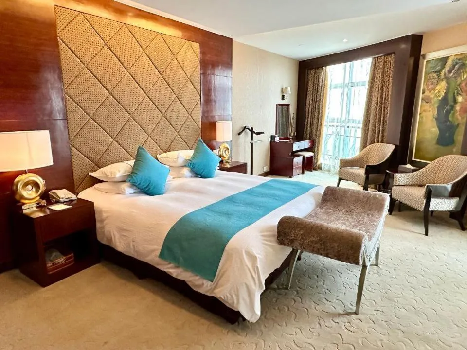 Bed in Royal Palace Hotel Haining