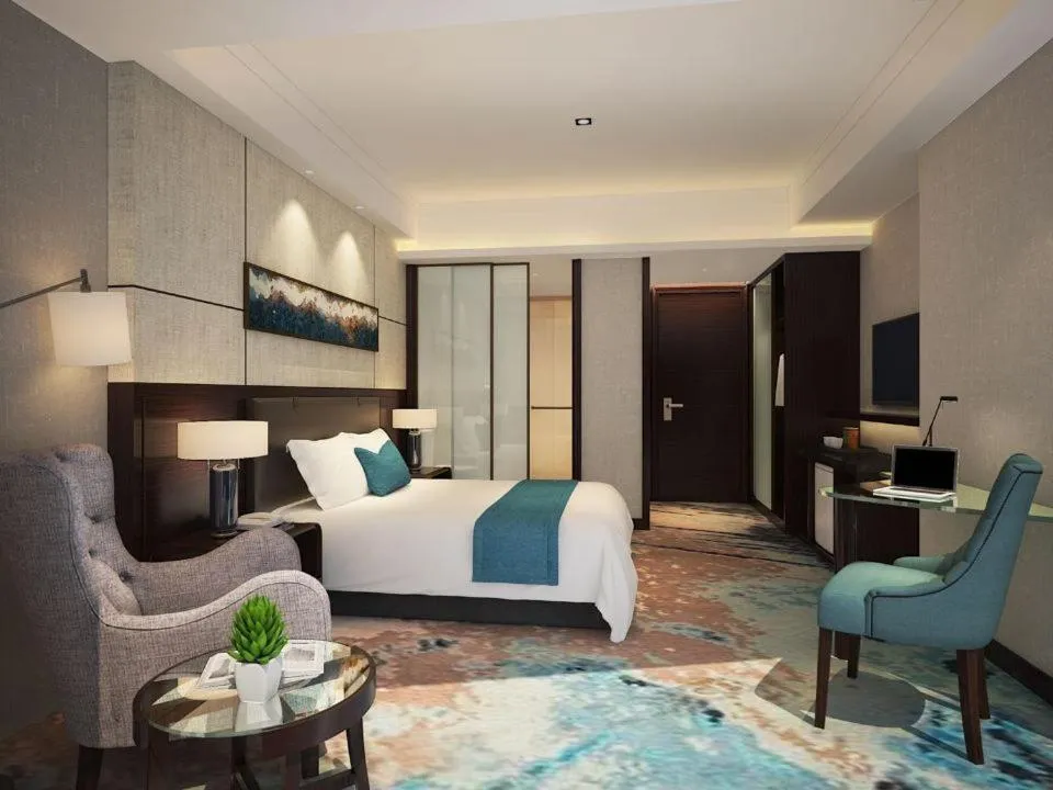 Bed in Royal Palace Hotel Haining