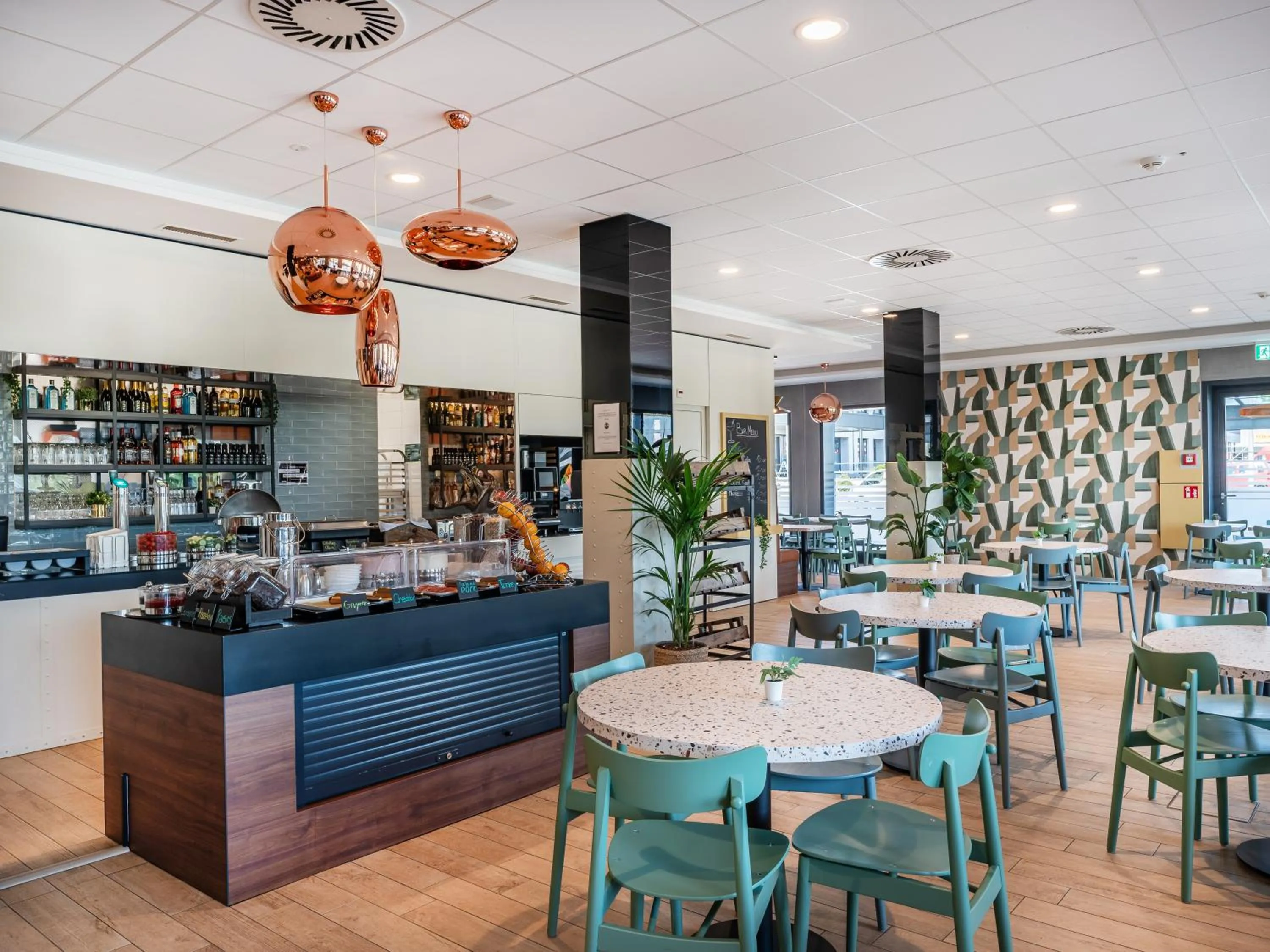 Lobby or reception in B&B HOTEL Zürich Airport