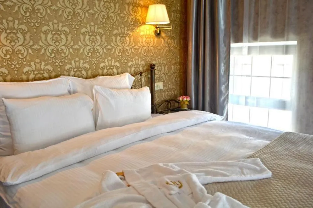 Bed in Redline Hotel