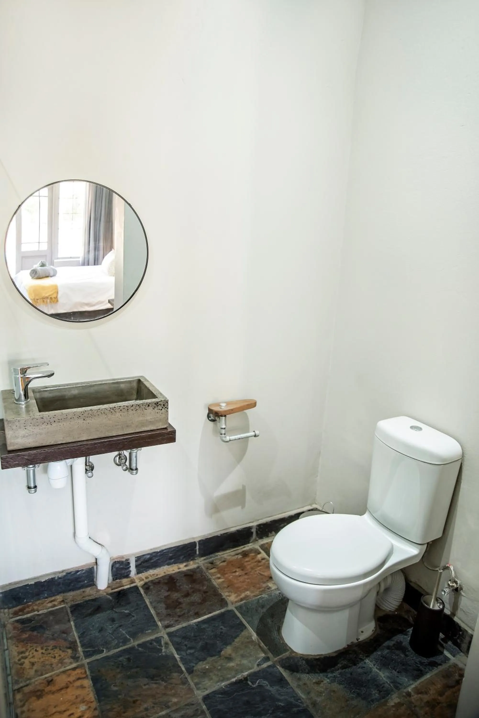 Toilet in Blue Rain Guest House