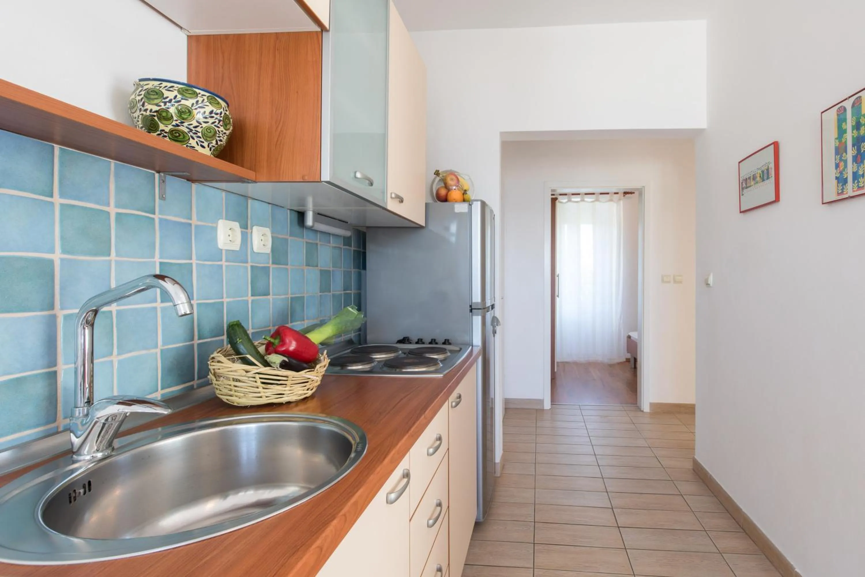 Kitchen or kitchenette in Apartments Ivona