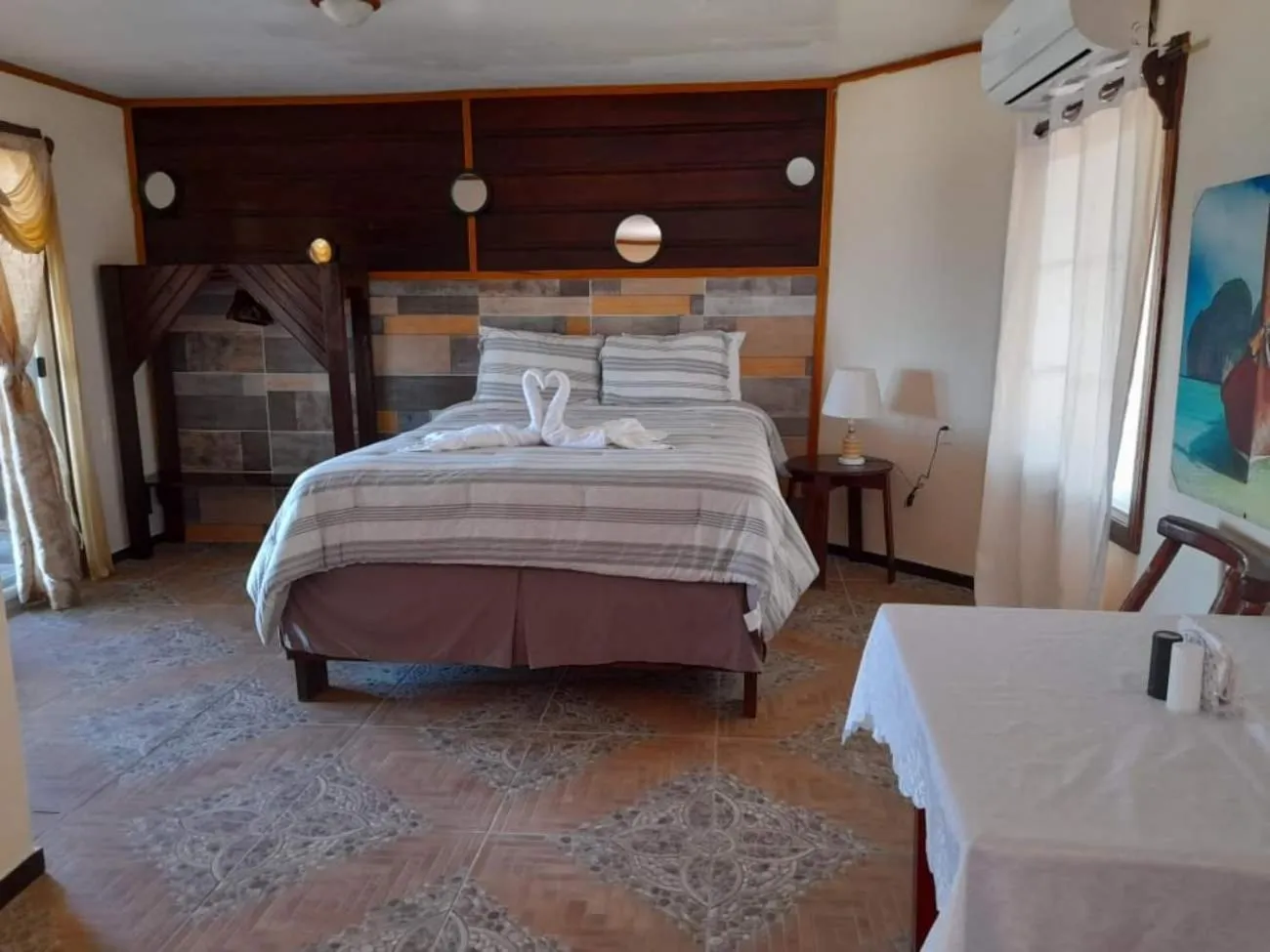 Bed in La Delphina Bed and Breakfast Bar and Grill