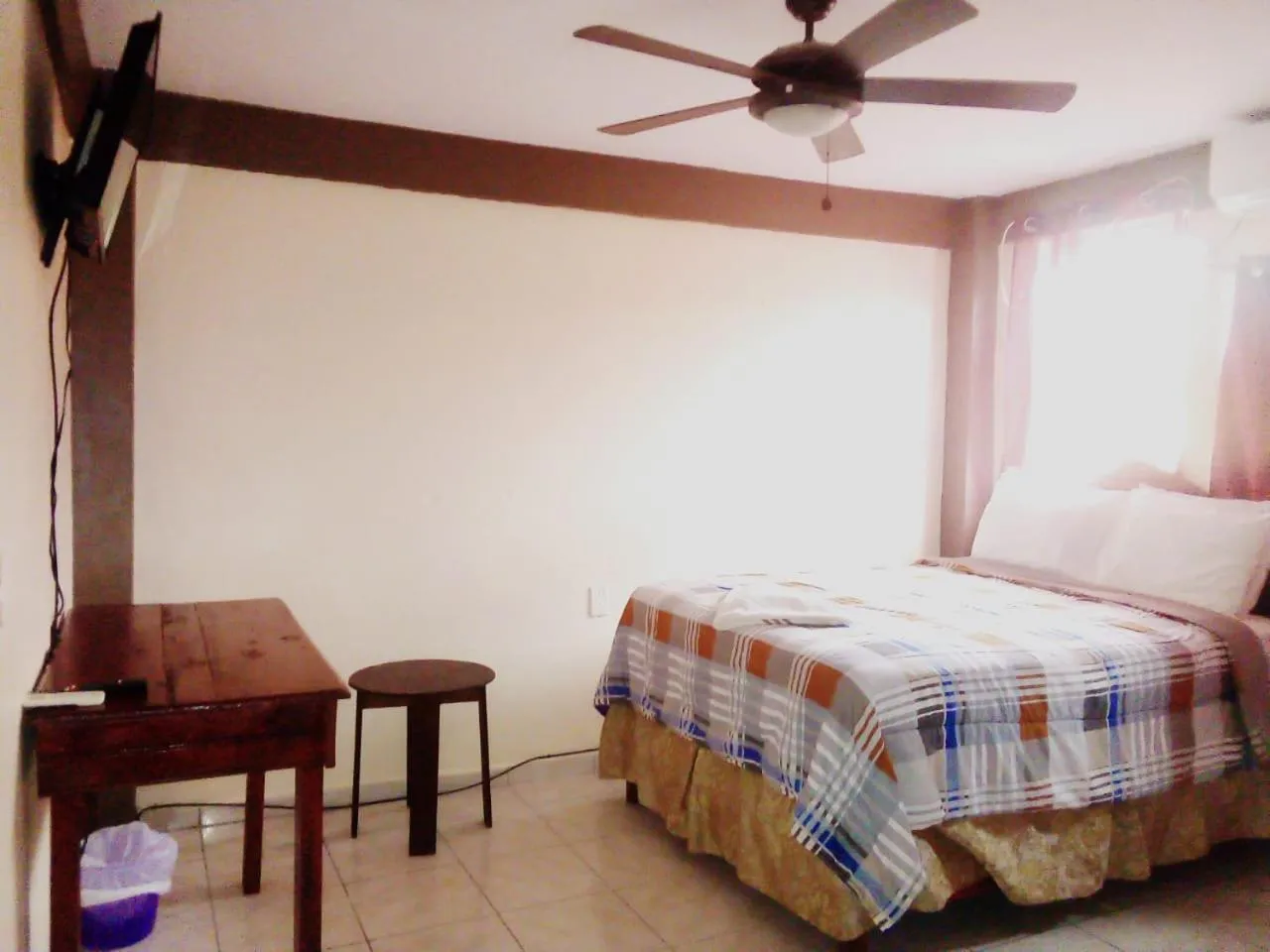 Bed in La Delphina Bed and Breakfast Bar and Grill